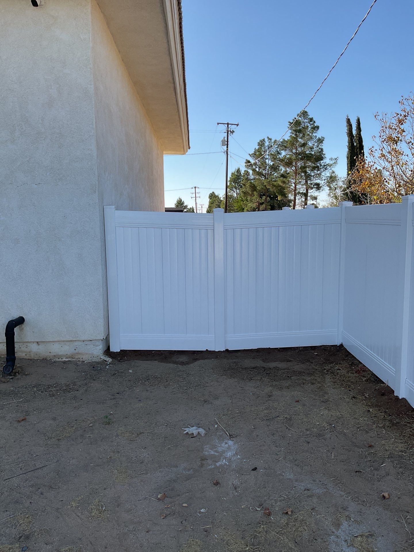 Fence Installation using Ranch Style Vinyl by Fence Guys Inc. 