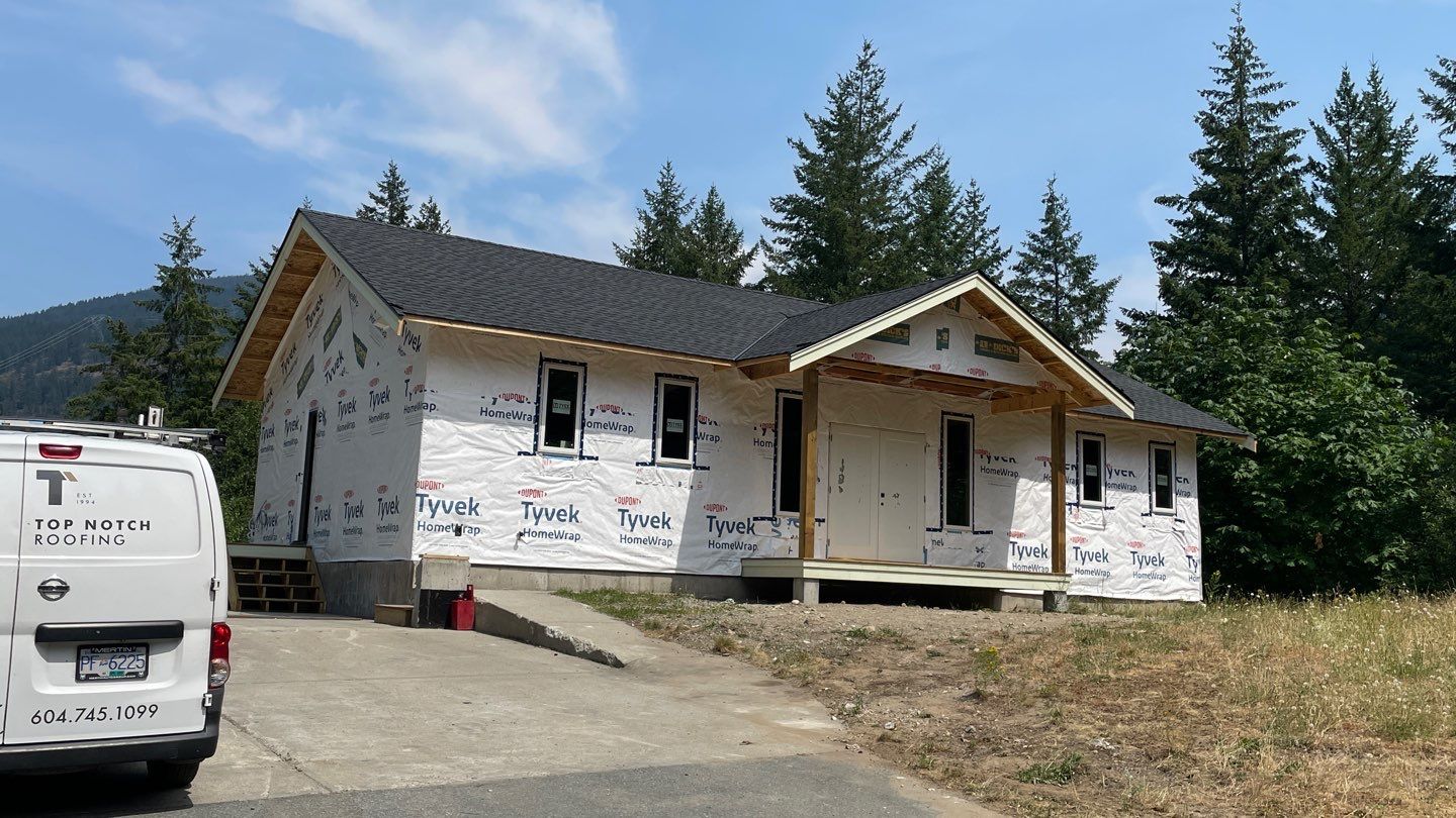 Residential Roofing Installation using GAF timberline HDZ Charcoal by Top Notch Roofing Inc