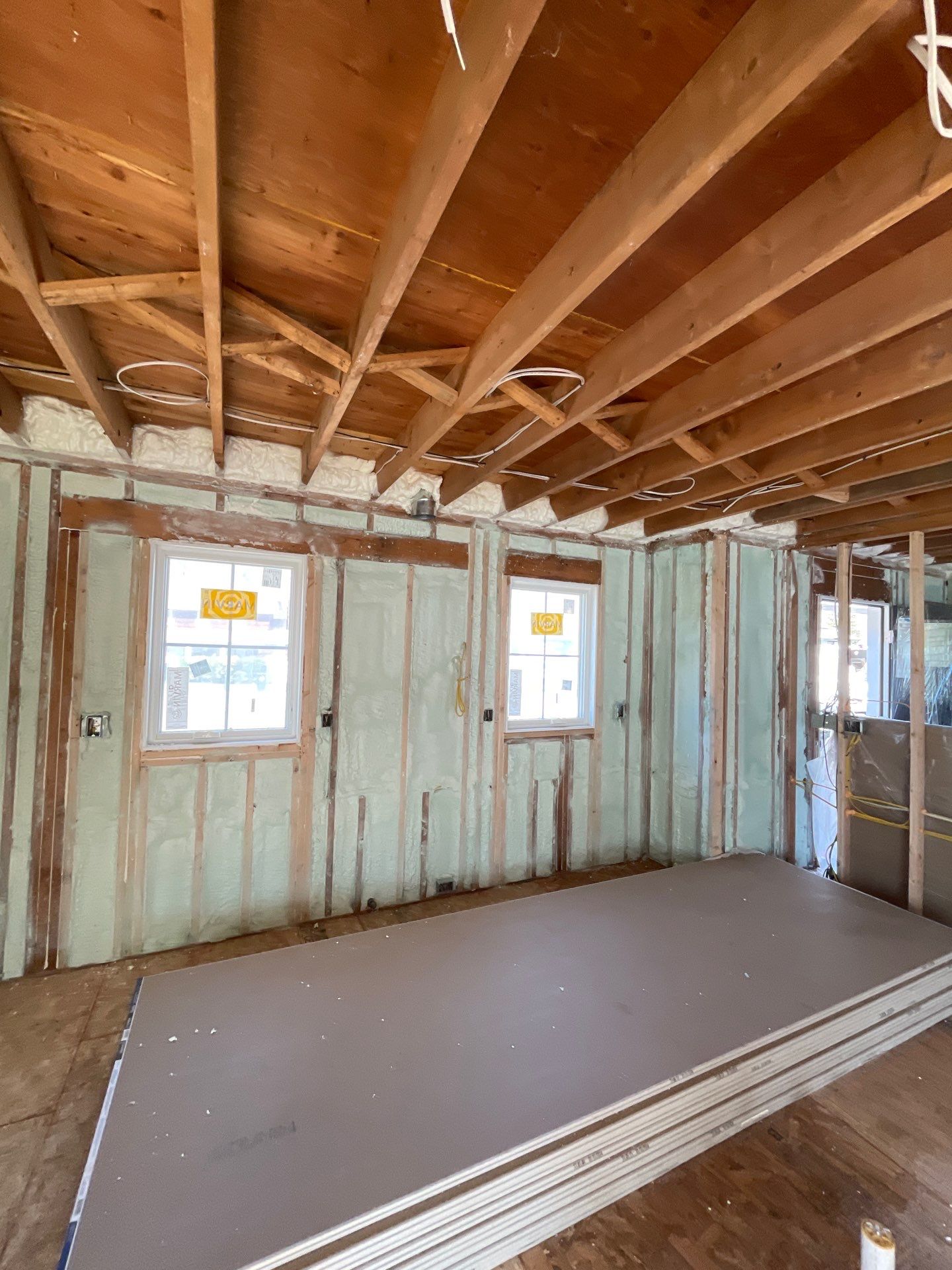 Basement Exterior Walls using Closed Cell Spray Foam by NYS Foam & Energy
