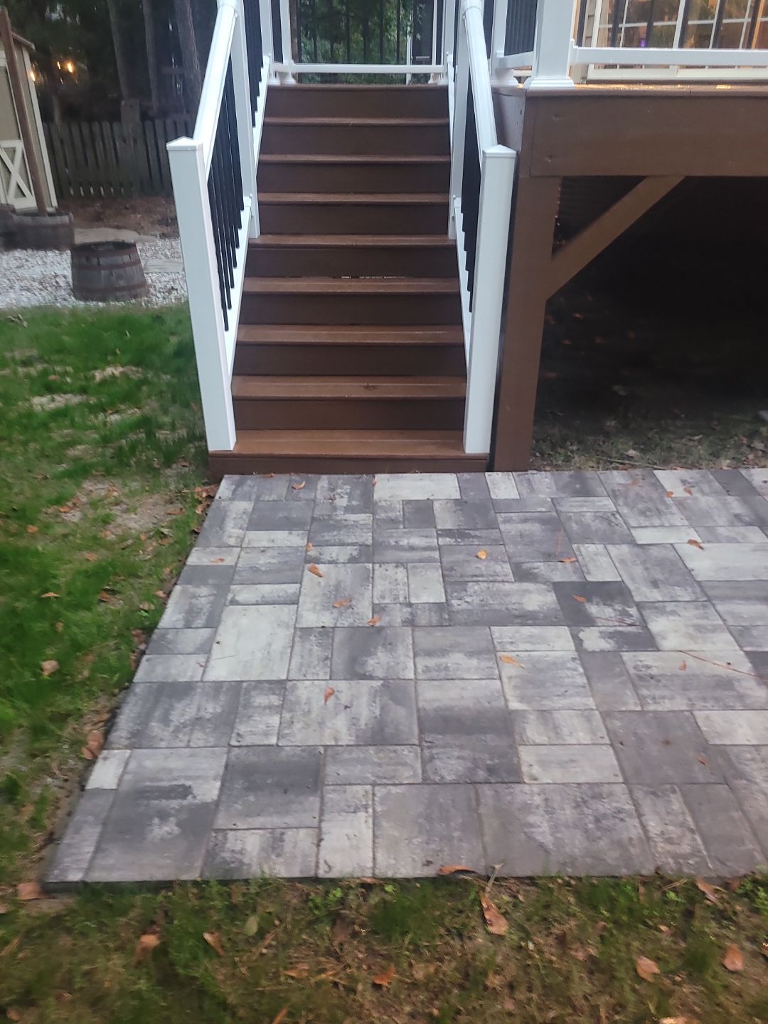Fuquay-Varina Outdoor Upgrade – Composite Deck & Paved Landing by Elite Remodeling and Design LLC