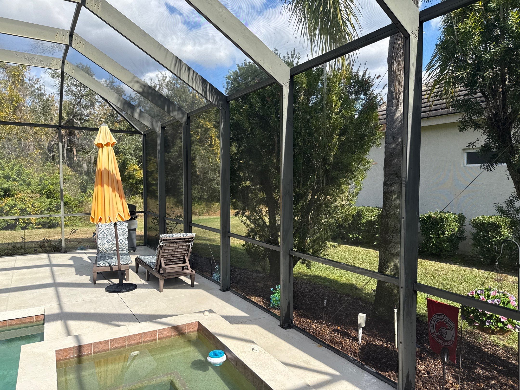 Painted Pool Deck, Lanai & Pool Cage Cleaning in River Club South – Bradenton, FL by Sunshine AquaWash