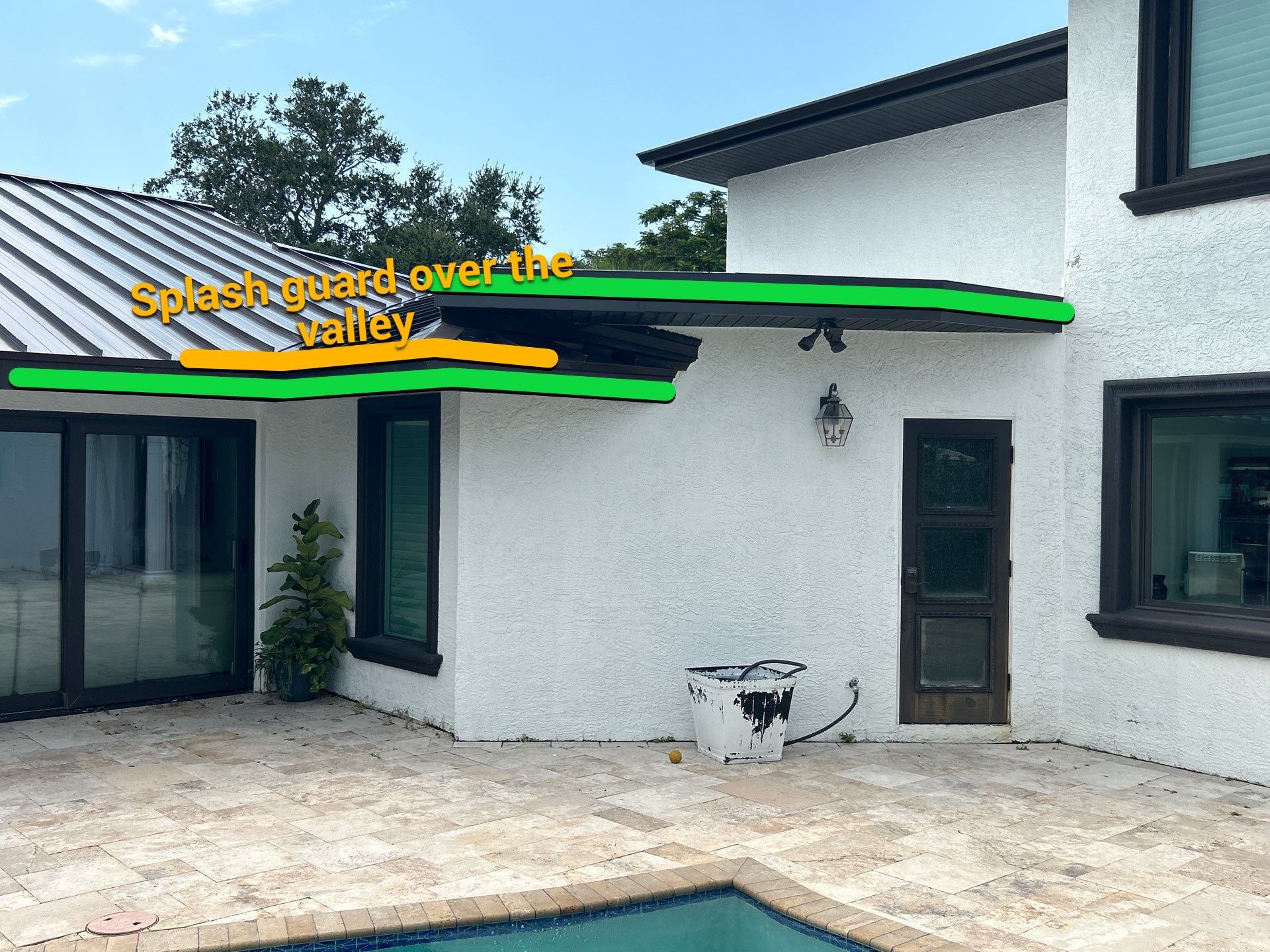 Black Seamless Gutters and Downspouts in Siesta Key FL by Gutter Professors