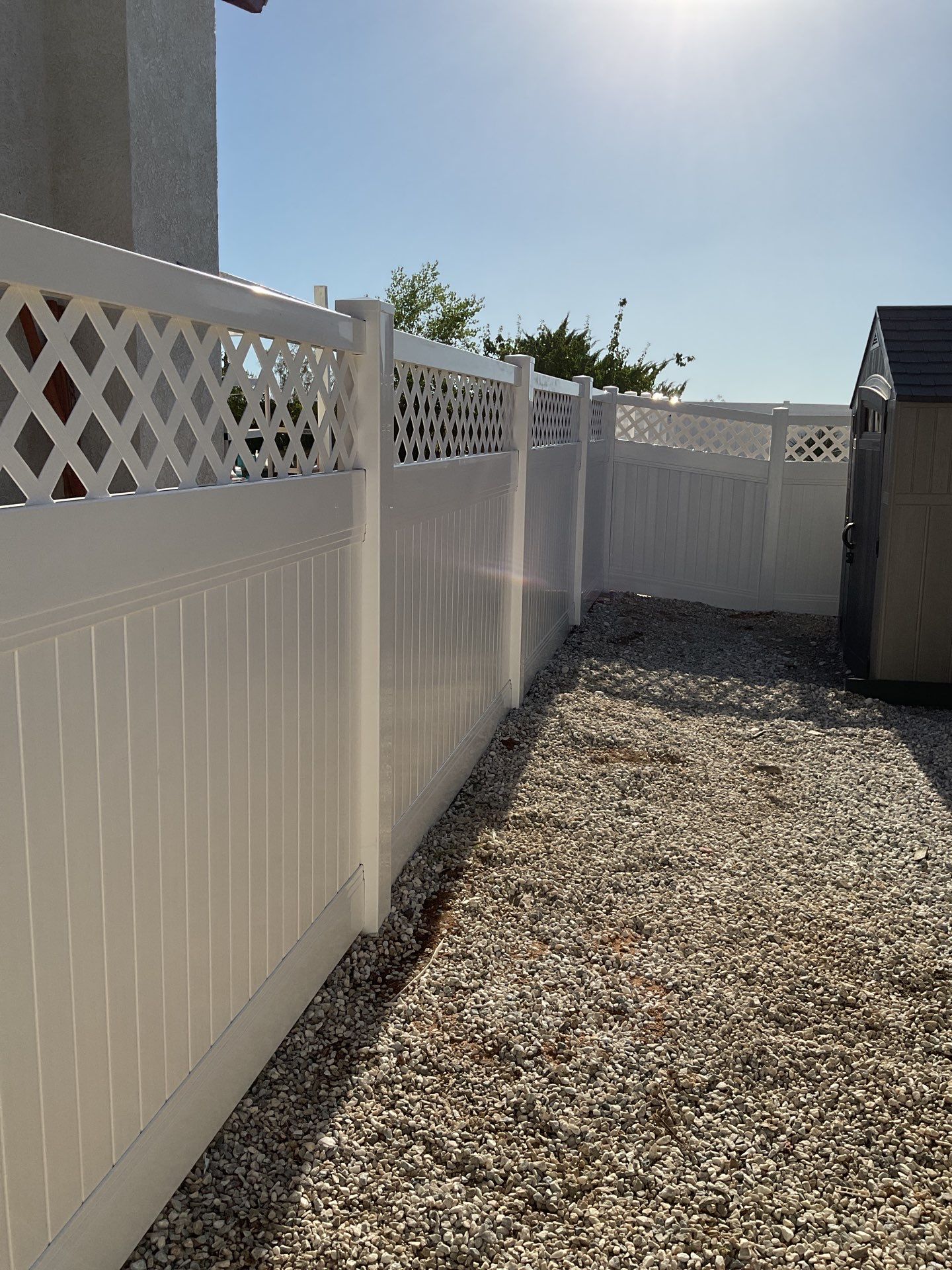 Lattice Vinyl with Privacy Vinyl Fence by Fence Guys Inc.