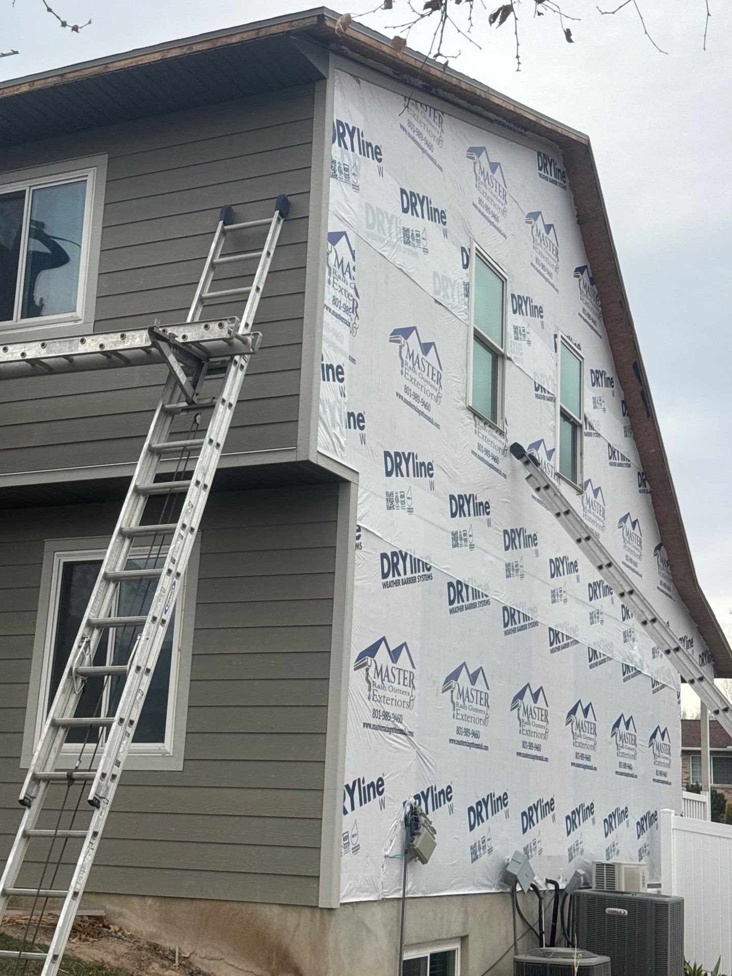 Siding in Lindon by Master Rain Gutters.