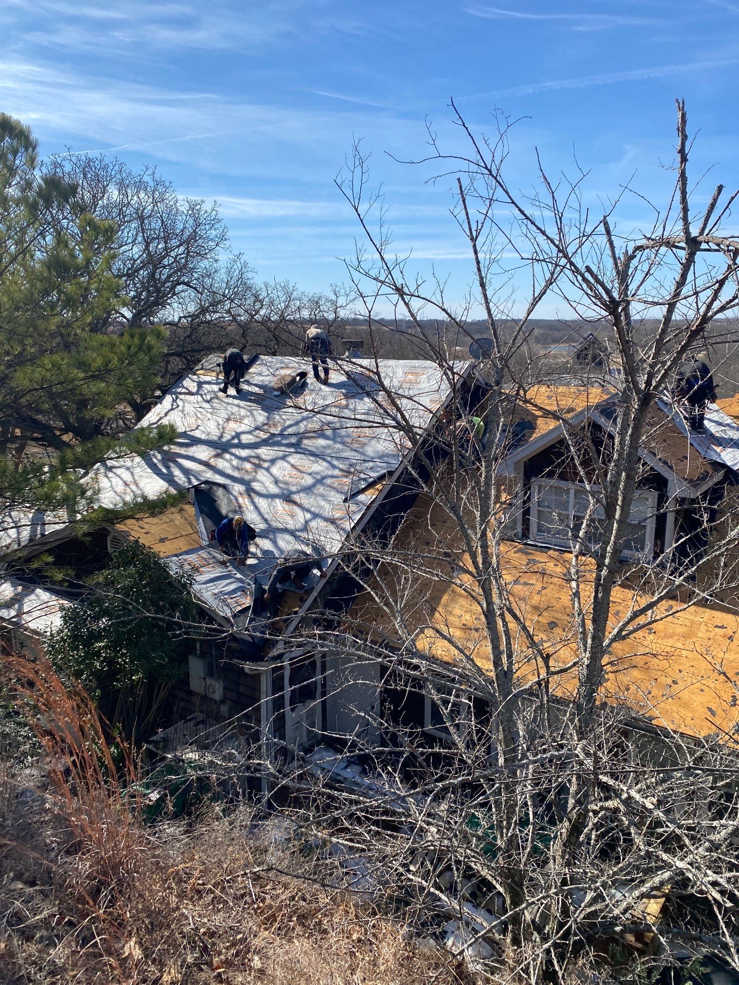 Roof Replacement on a private lake near Ardmore by BANA Roofing and Solar Supply
