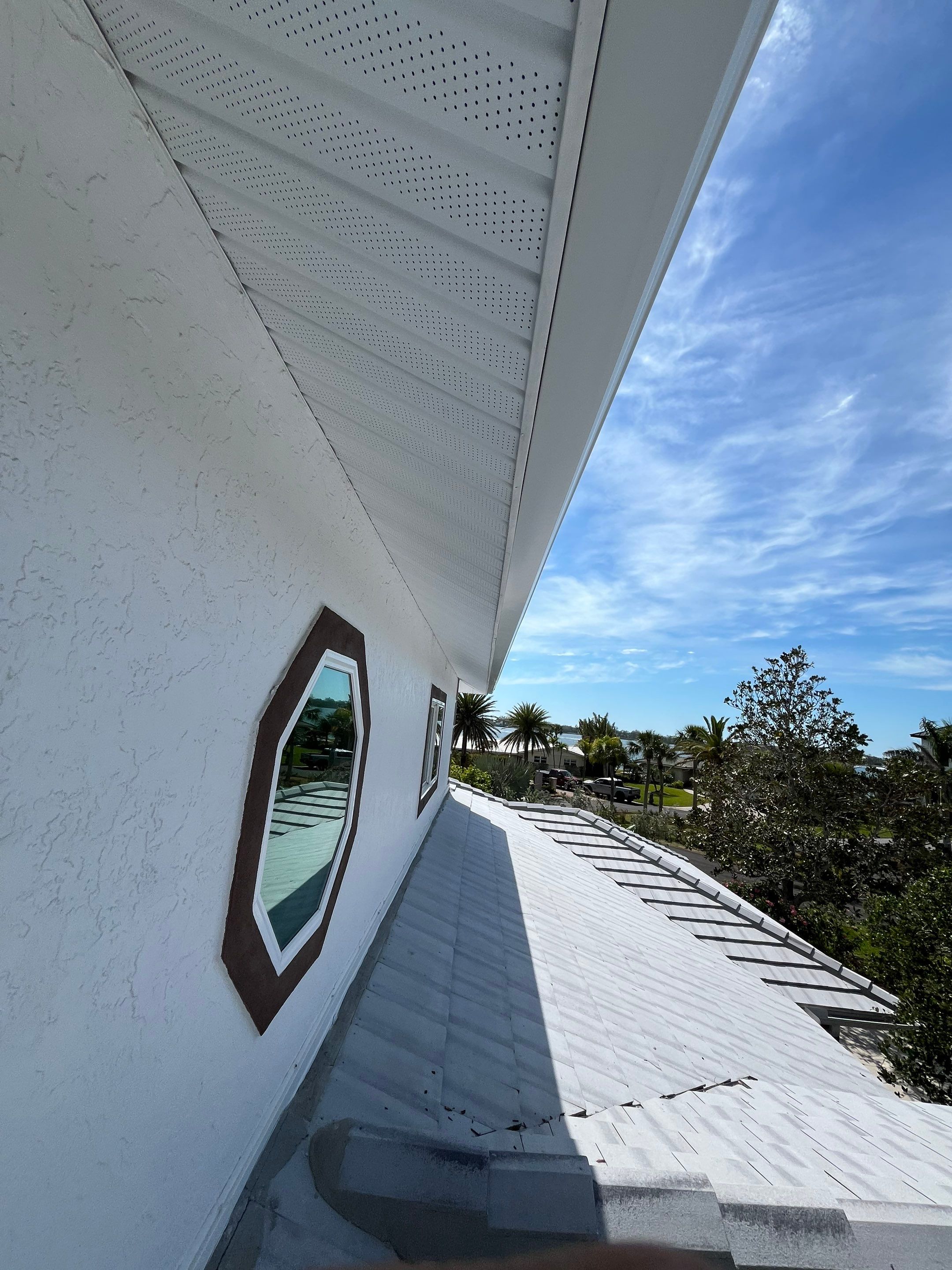 Repainting and Upgrading Gutters in Sarasota FL by Gutter Professors