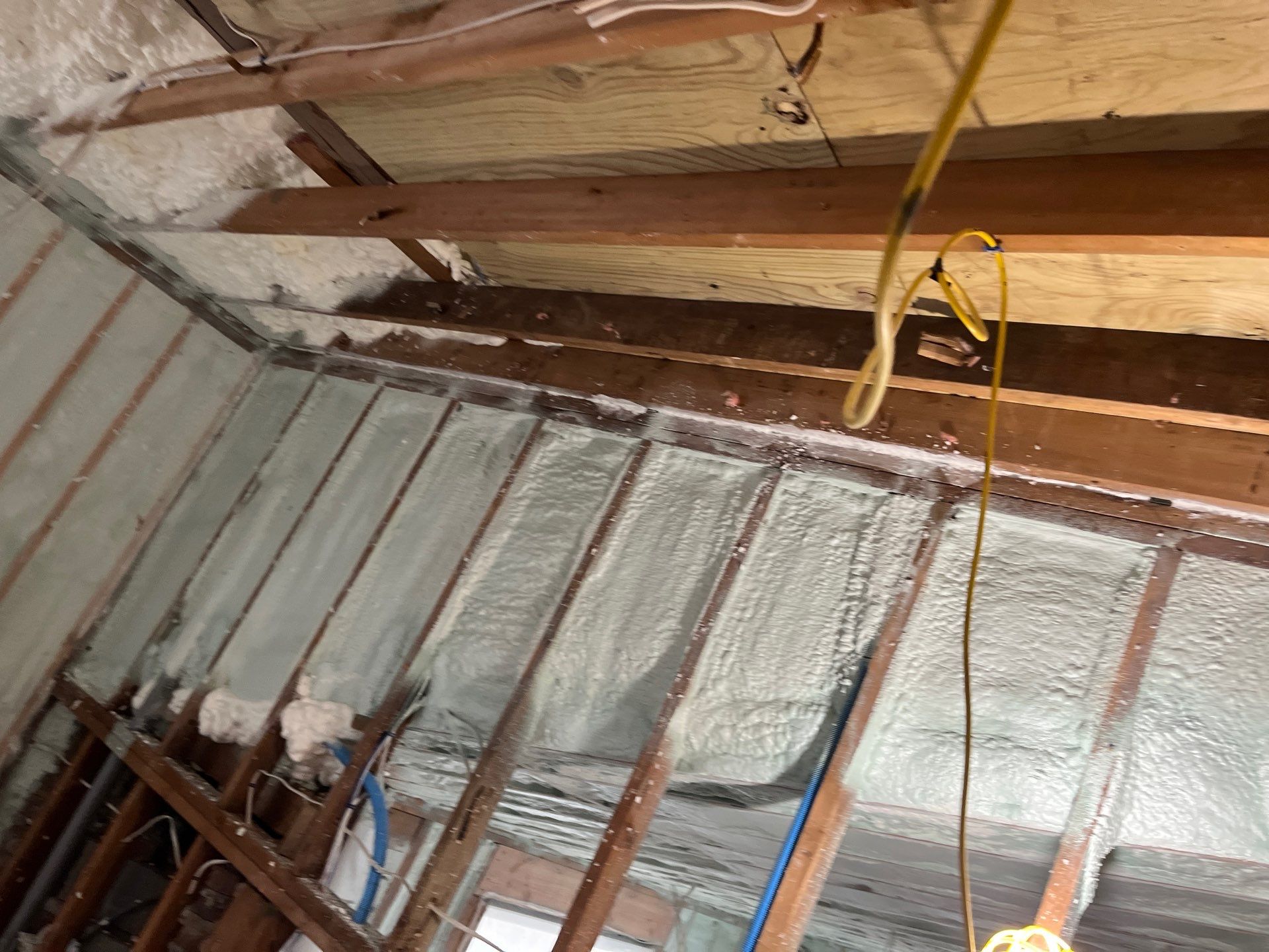Basement Exterior Walls using Closed Cell Spray Foam by NYS Foam & Energy