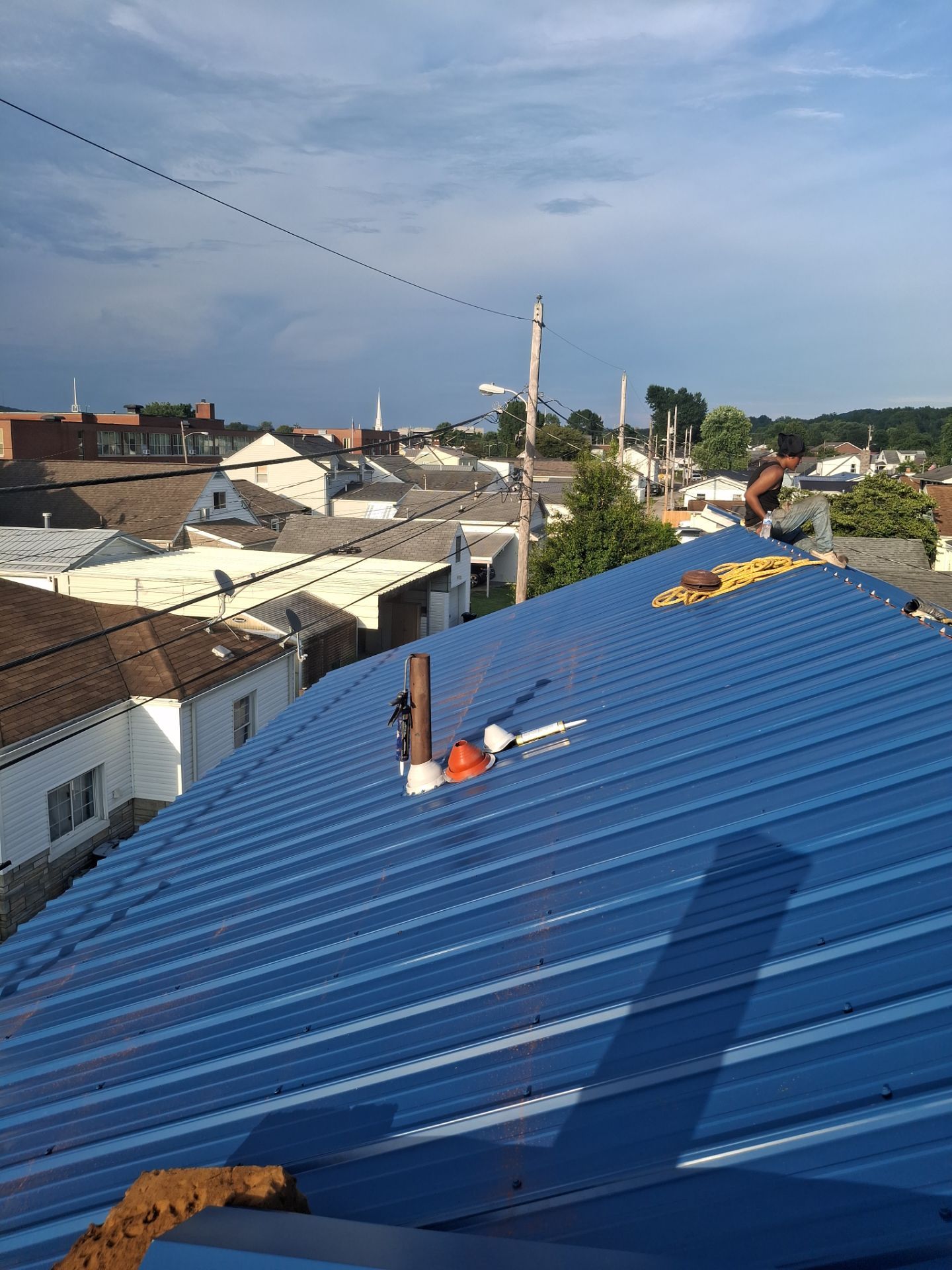 Residential Roofing Installation using Metal by Rainstoppers Roofing