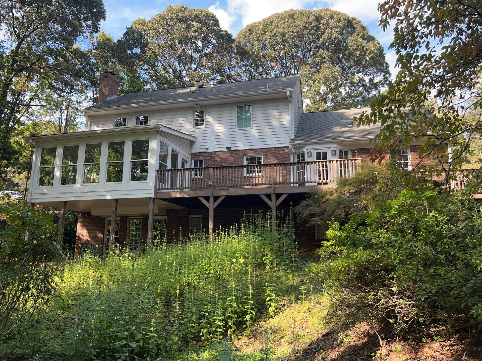 Deck Build and Screened-In Porch Install with Wild Hog 6' Black Mesh Panel Railing by Nelson Exteriors