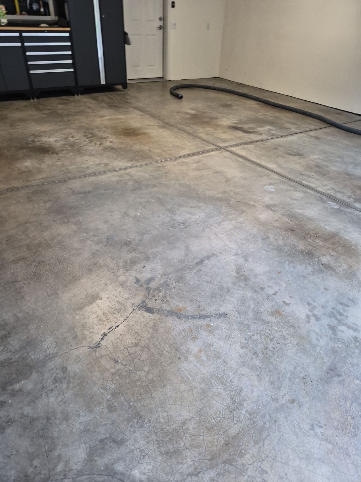 Liberty Lake Garage Transformation with Turquoise Hybrid Polyurea Floor by Croc Coatings, LLC