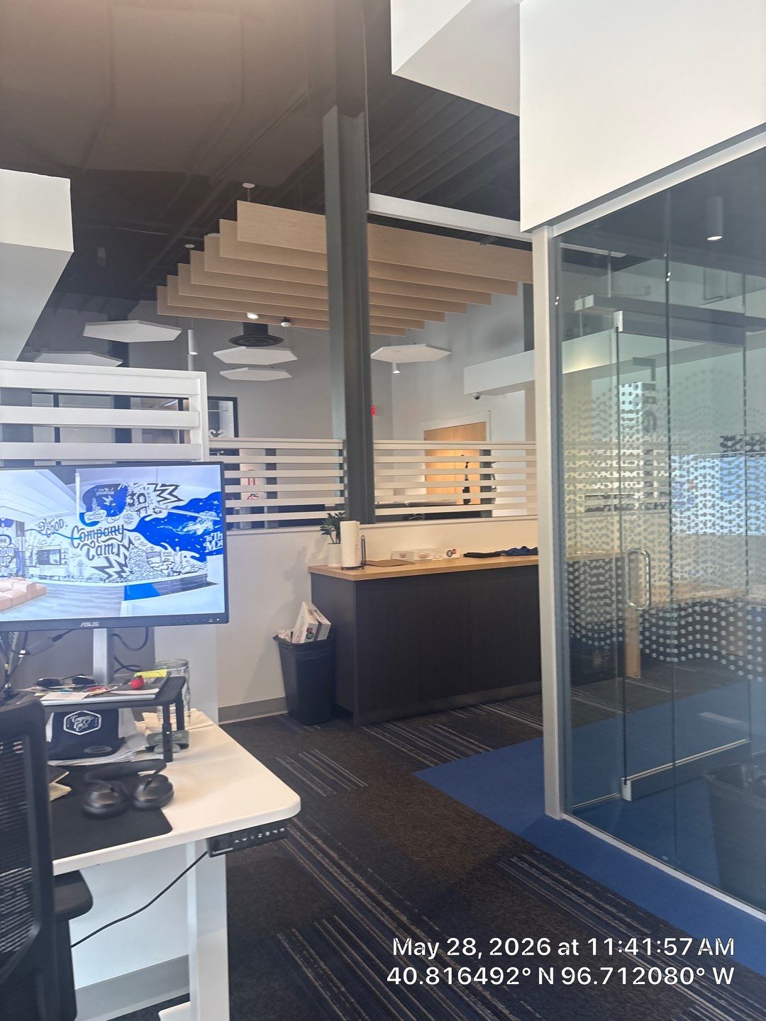 Modern Office Remodel with Acoustic Baffles and Glass Partitions by CompanyCam Sales Demo