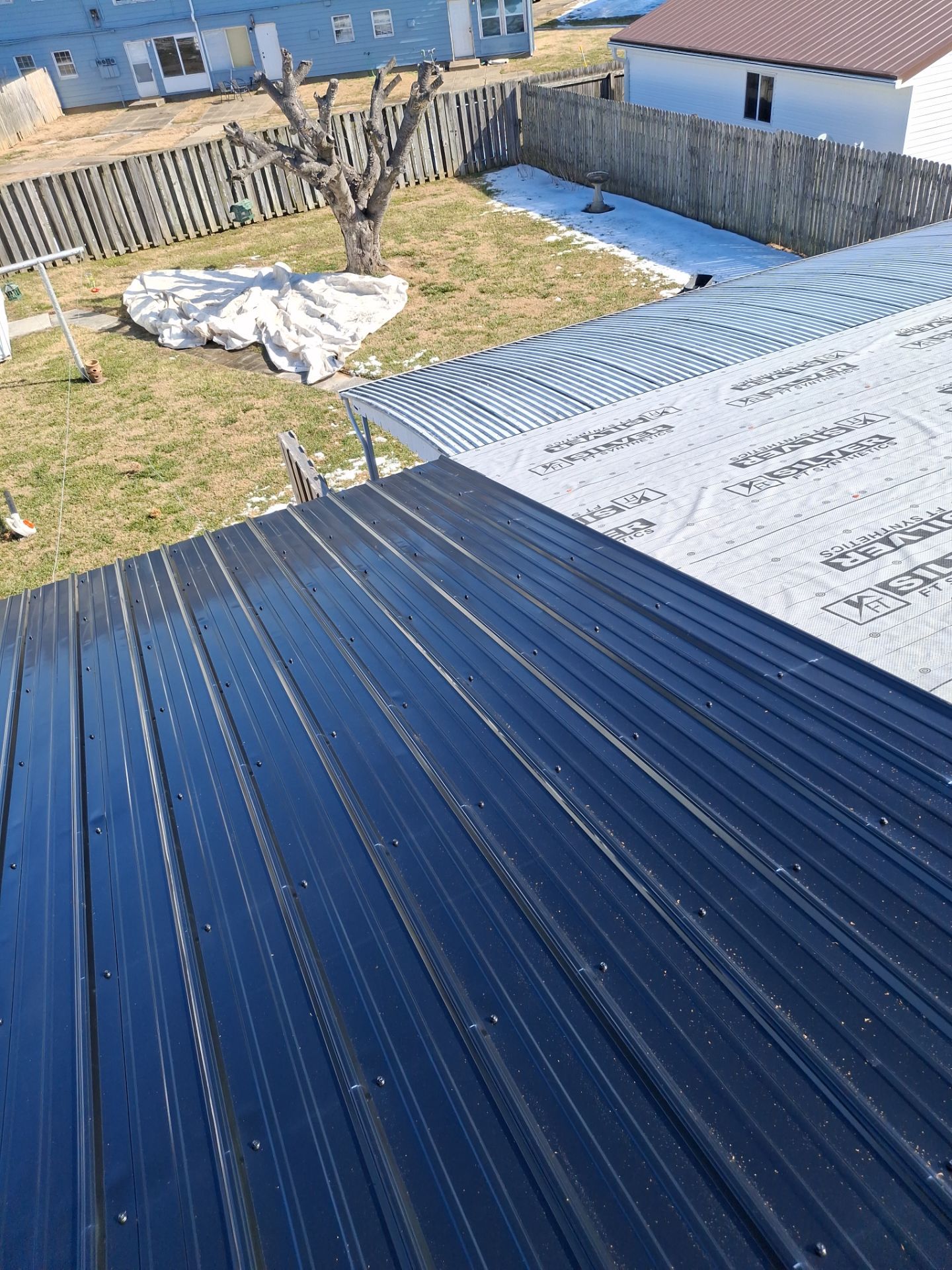 Residential Roofing Installation using Metal by Rainstoppers Roofing