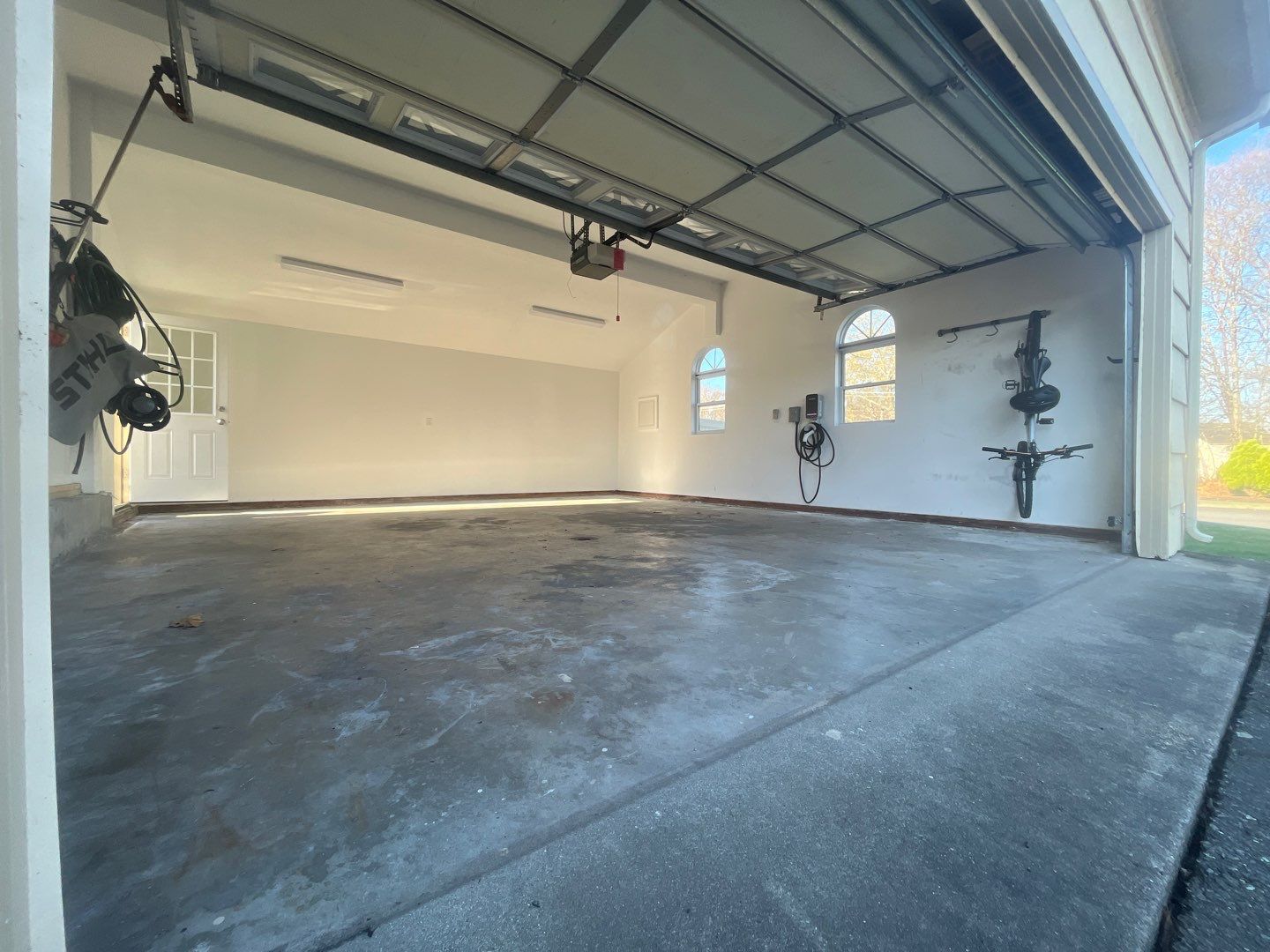 Garage in Shrewsbury, MA 01545 by Symphony Concrete Coatings