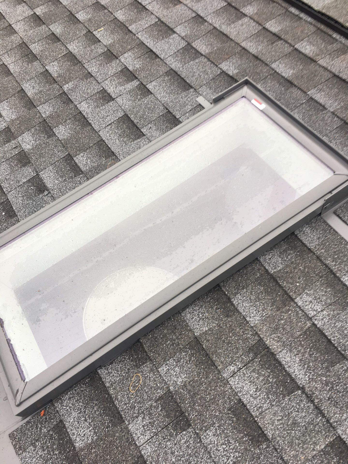 Roof and Skylight Replacement by American Home Contractors