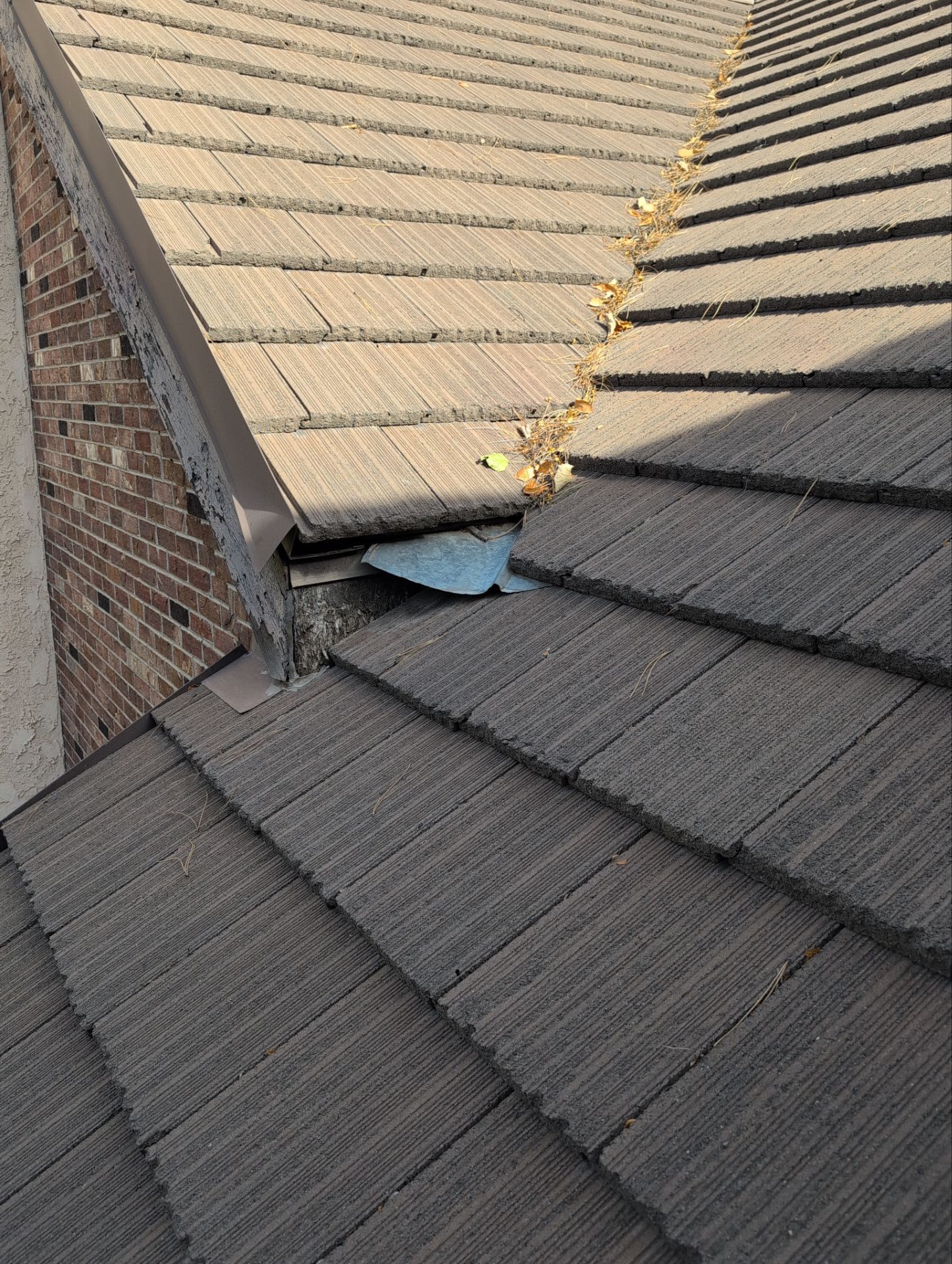 Unified Stone Coated Roof & Stucco Remodle by Blue Peaks Roofing LLC