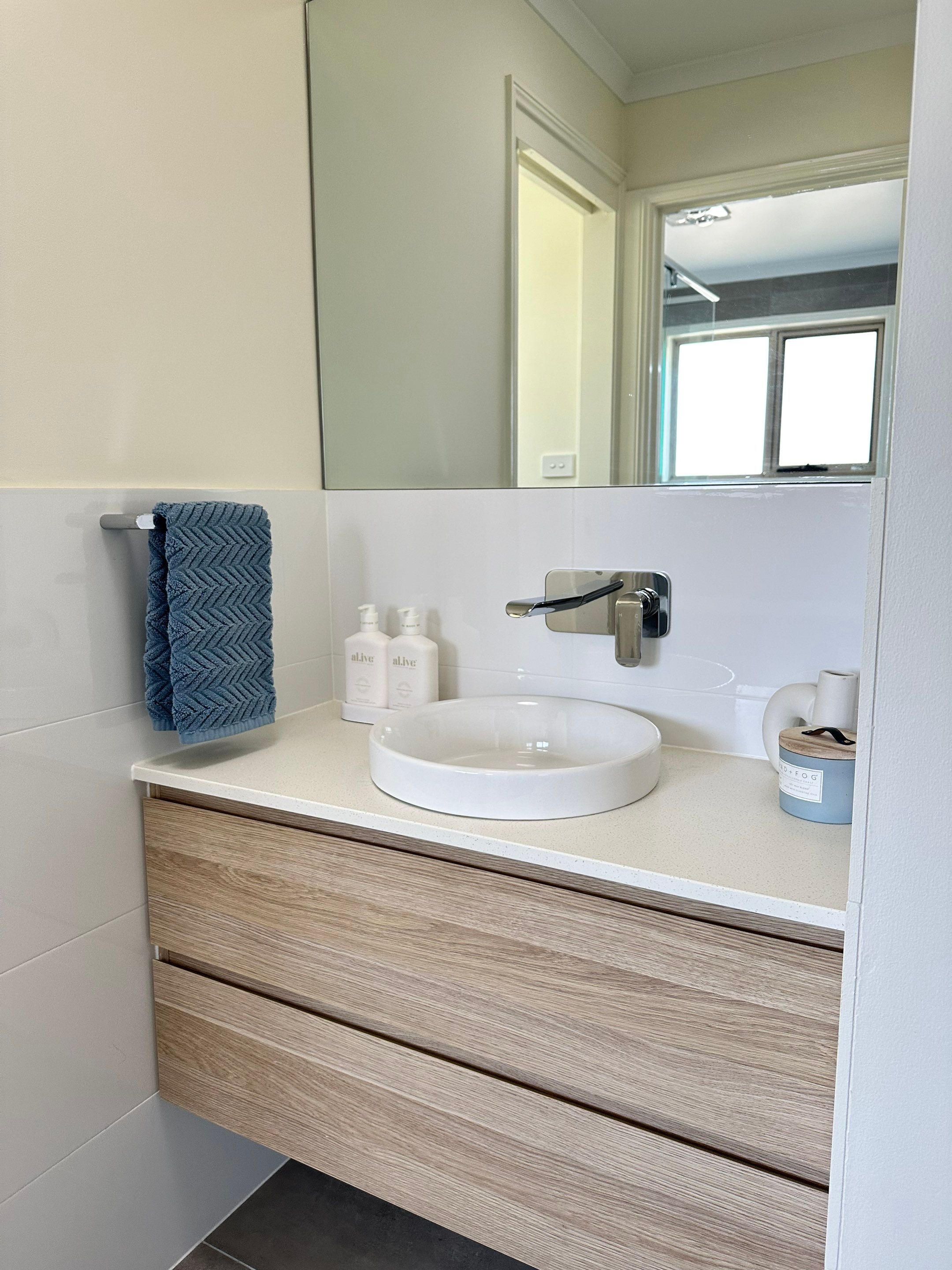 Main Bathroom, Ensuite, Toilet, Powder Room, and Laundry Renovation by Re-seal Bathrooms