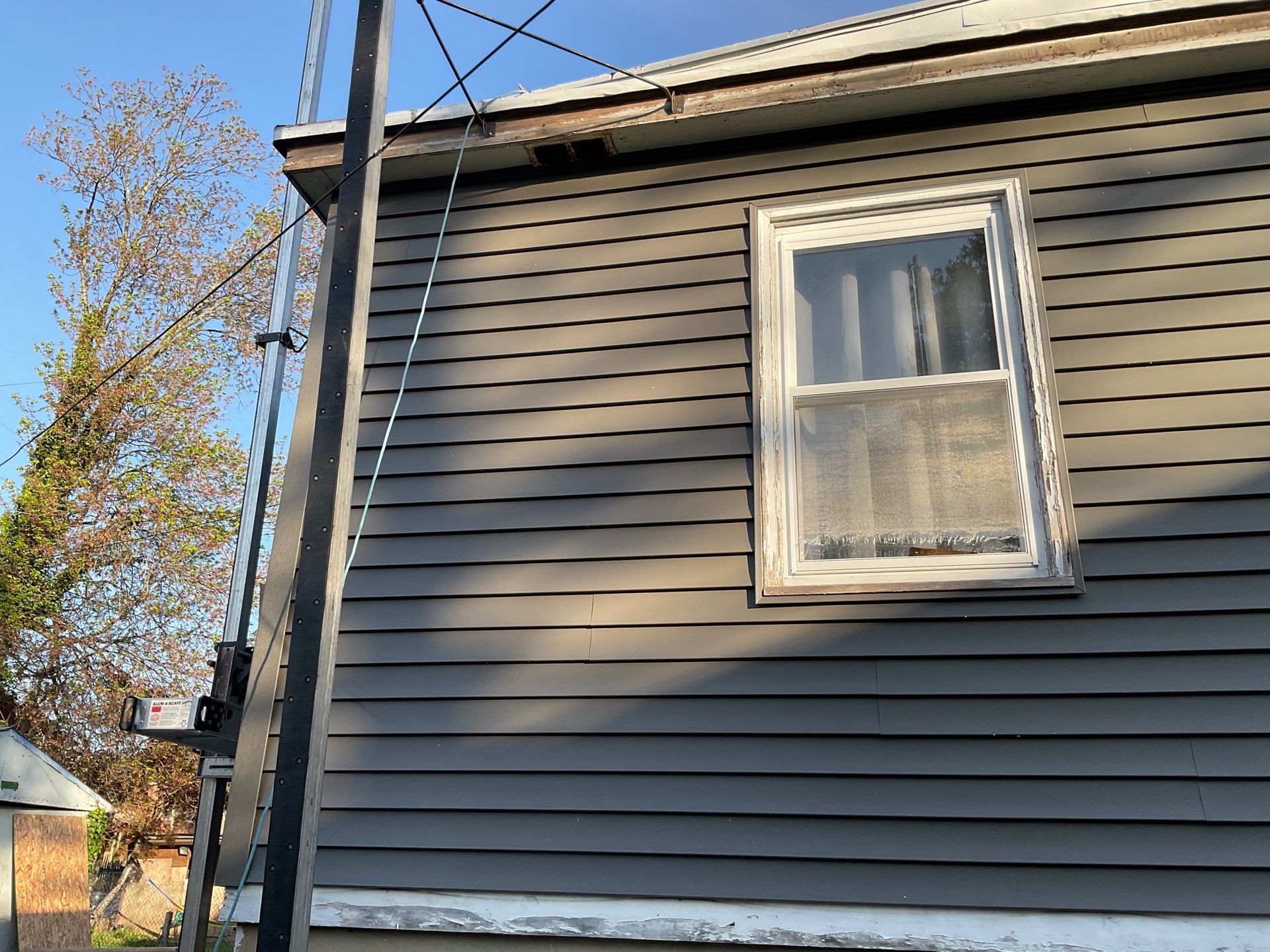 New siding & New Gutters by Alpha Design Services