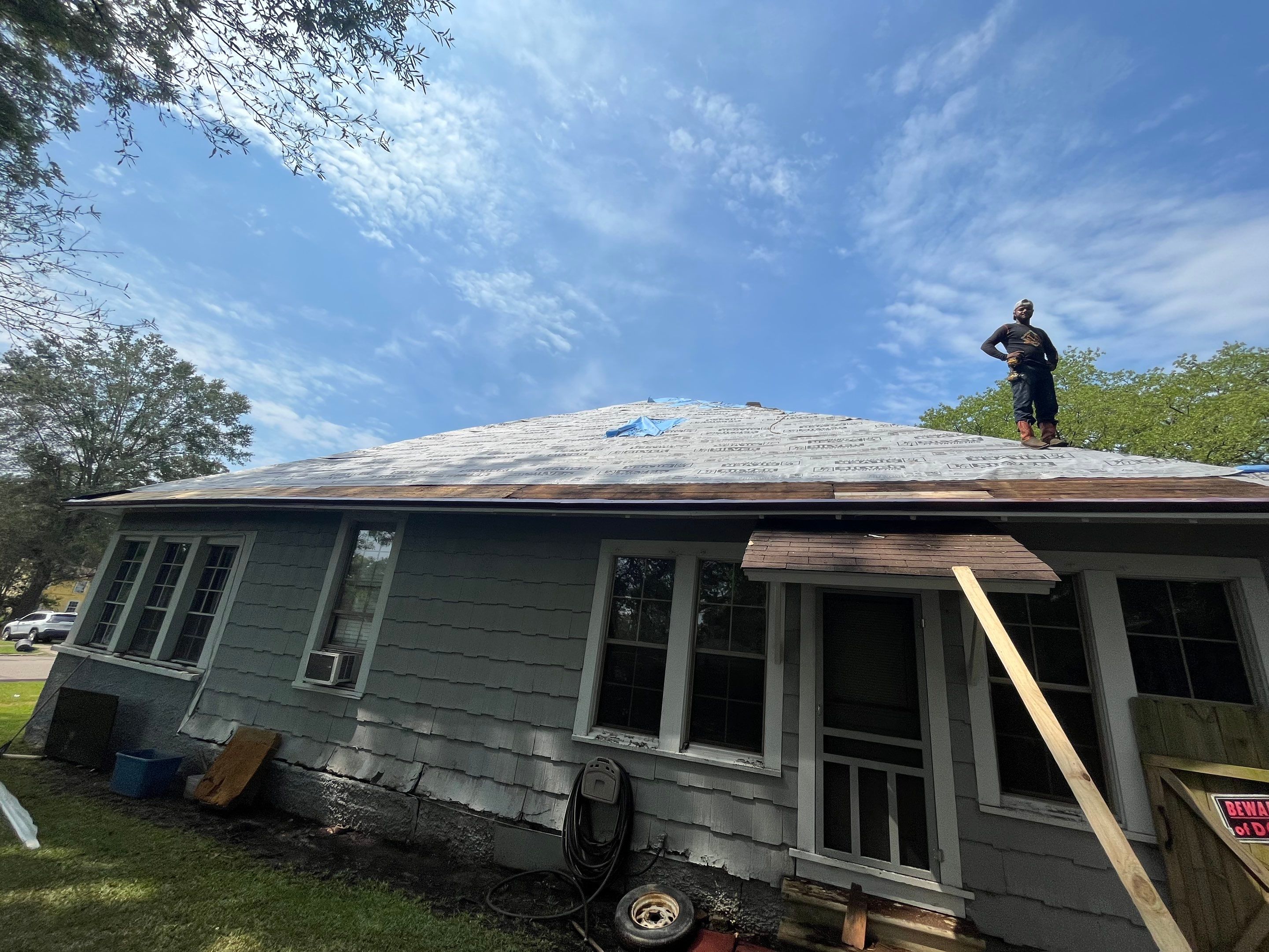 Residential Metal Roof Replacement using Reed's Metals: Colored Residental Panel (Burgundy) by Hostetler Roofing