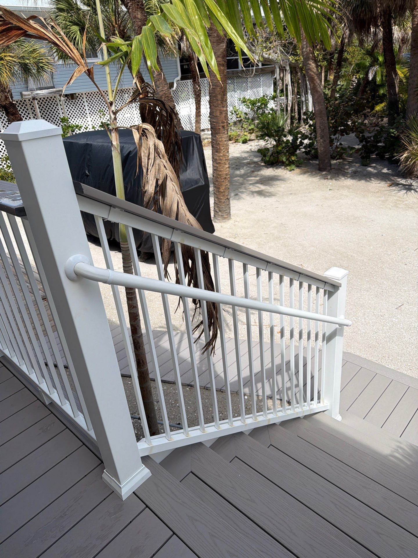 Elevated Deck and Composite Staircase Replacement in Placida Florida by Smirnov Construction Inc