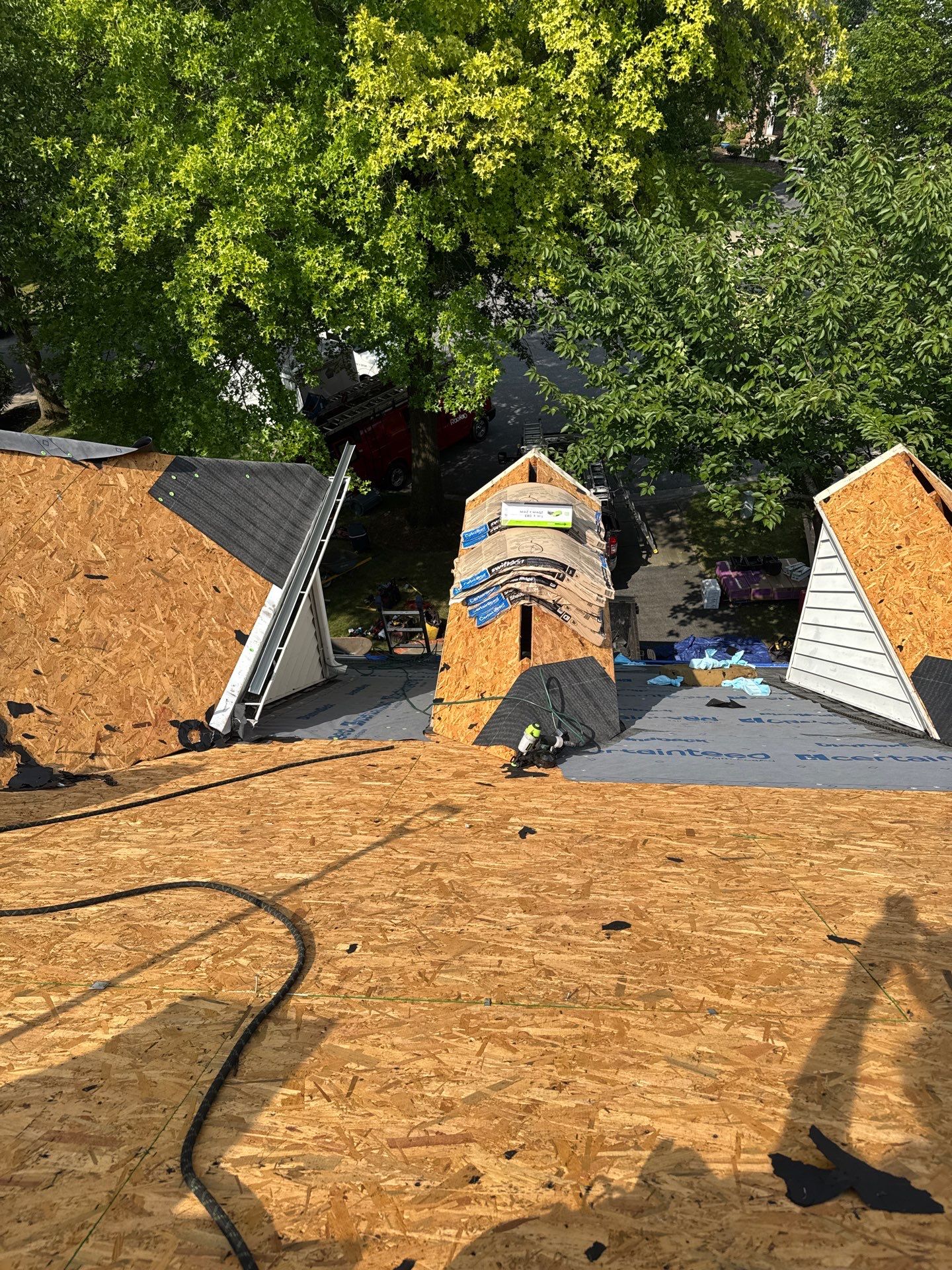New Shingle Roof & New Gutters and downspouts with covers by Alpha Design Services
