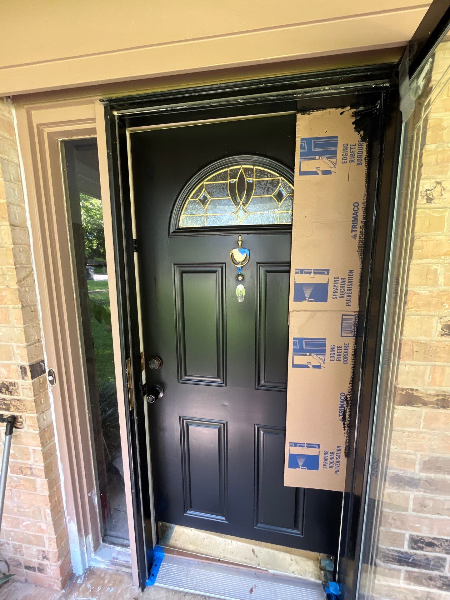 Exterior Painting in Tyler, TX | Eaves, Door & Columns in Elegant Black by Quality Coats Painting