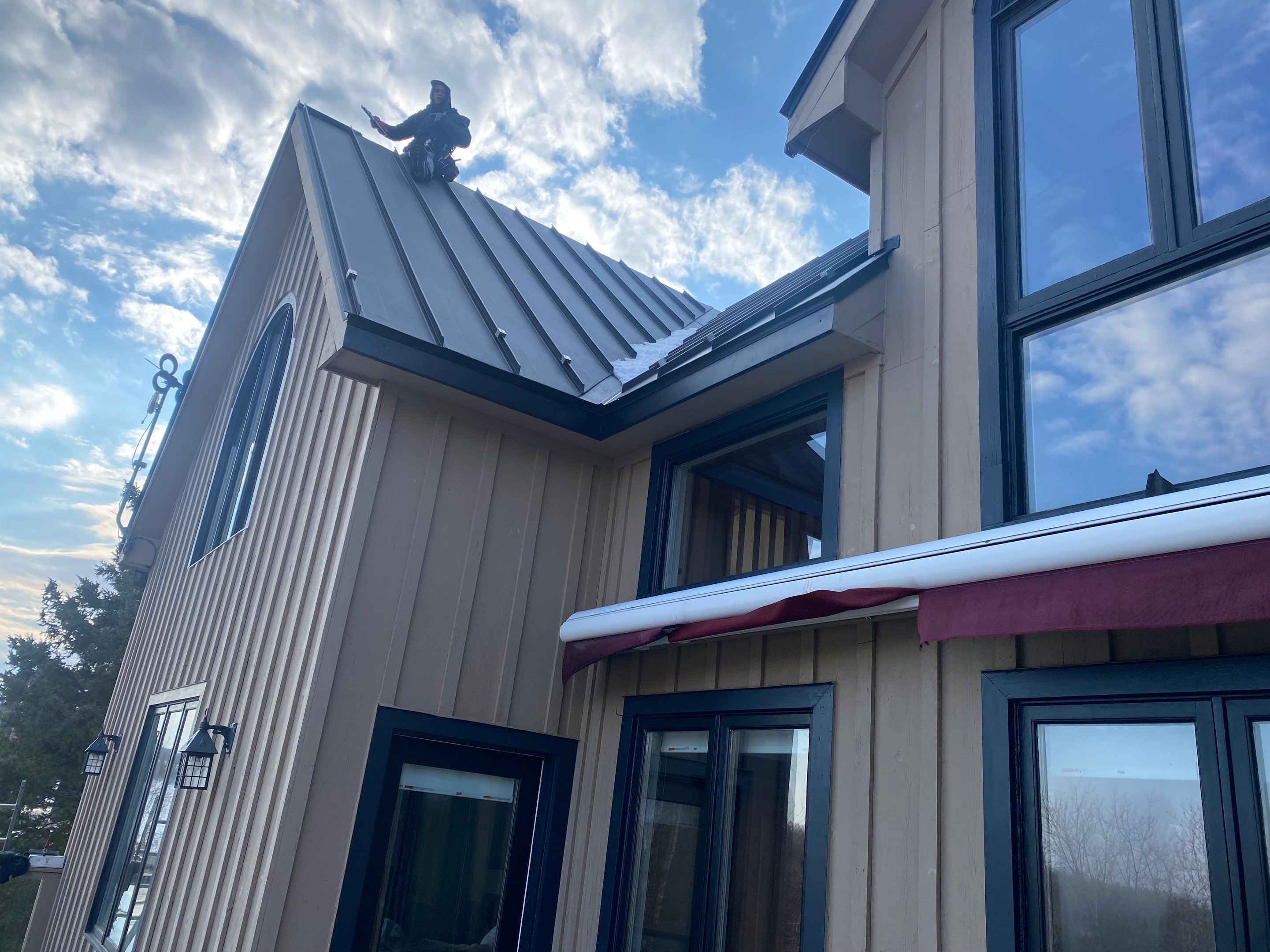 Residential Roofing Installation using 24 Ga Standing Seam Metal by Jay Carter Roofing & Sheet Metal