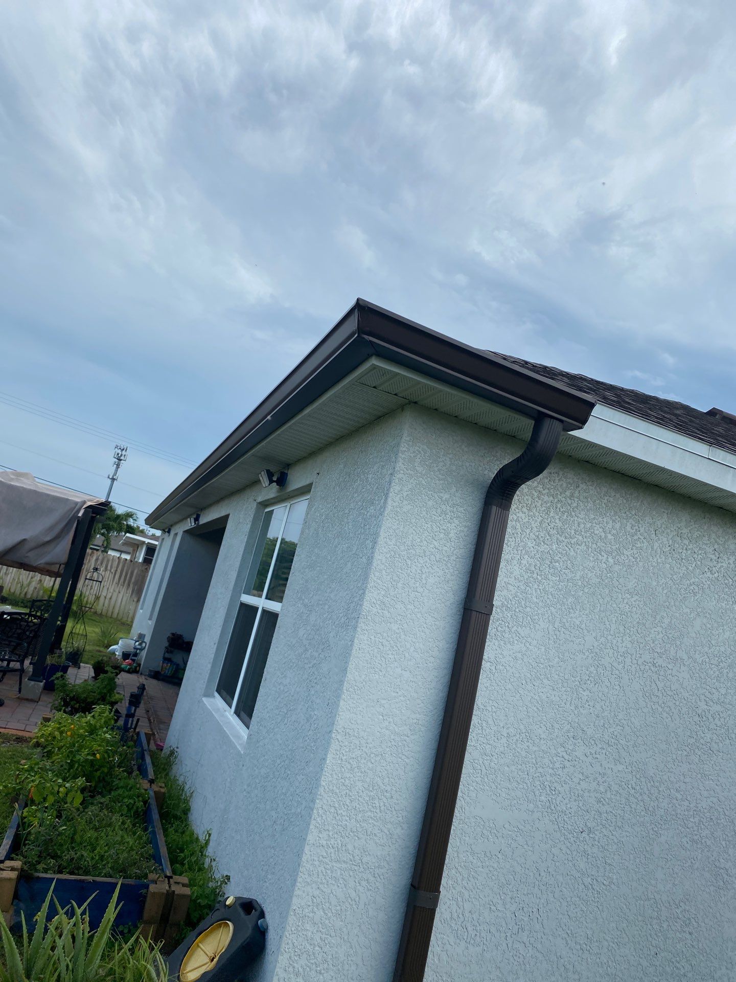 Brown Seamless Gutters using Royal Brown in Cape Coral FL by Gutter Professors