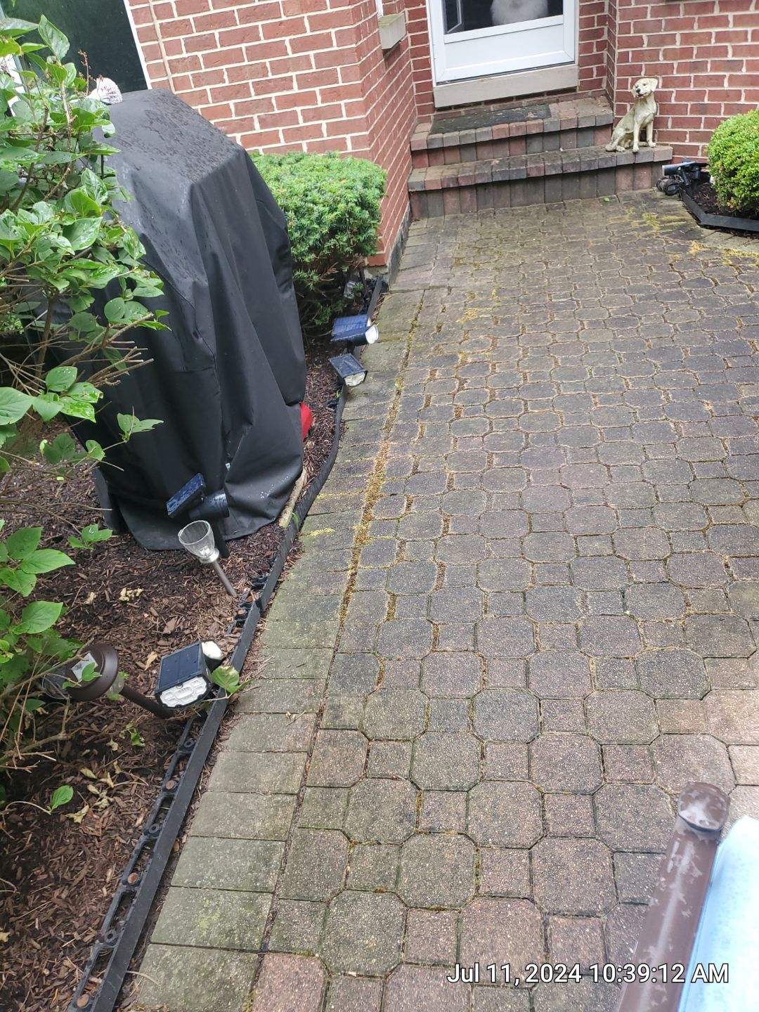 Brick paver repair, clean and seal by Northern Power Washing LLC.