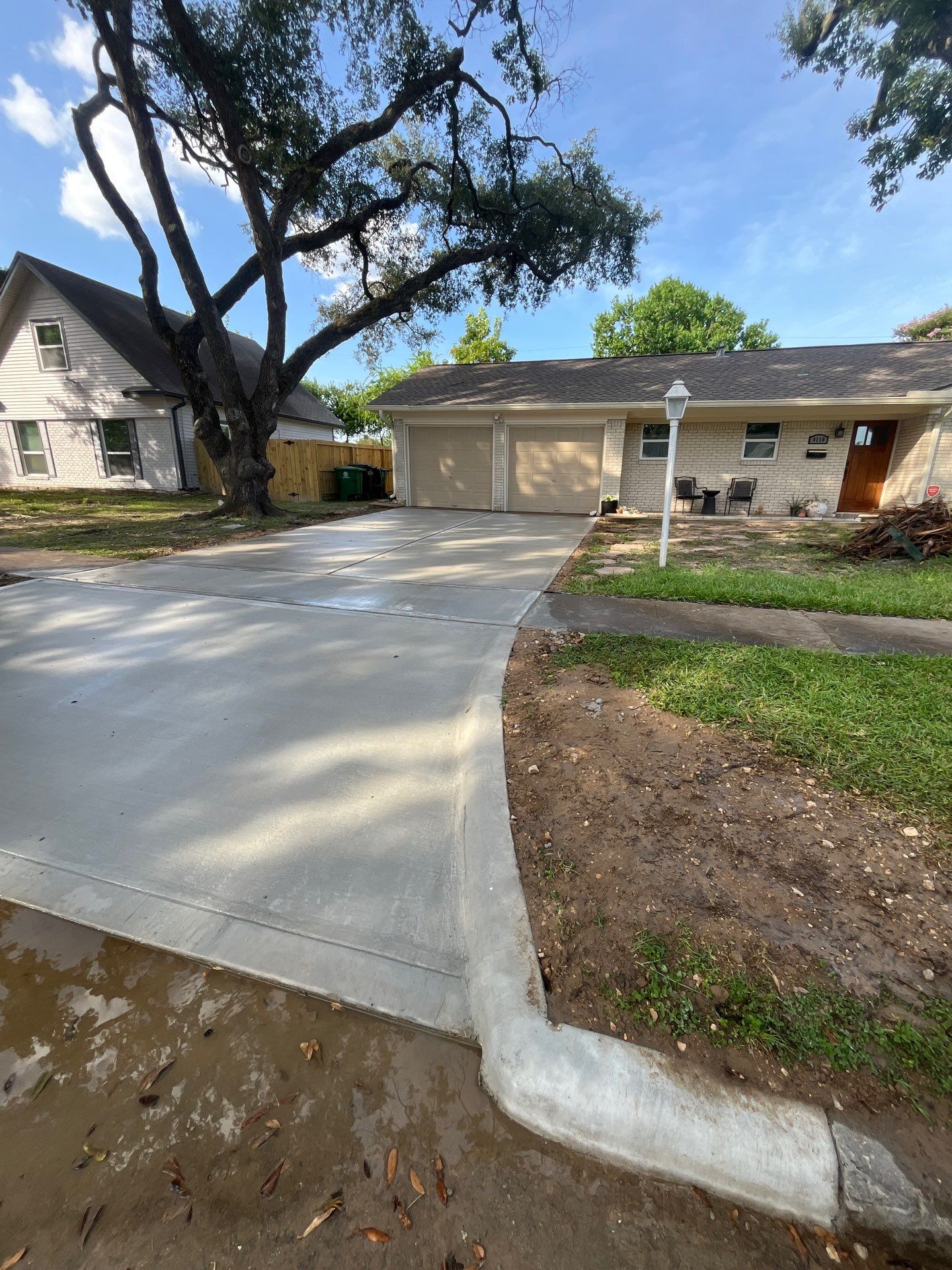 Houston Residential Concrete Driveway Installation and Bathroom Remodel by Rolling Nations