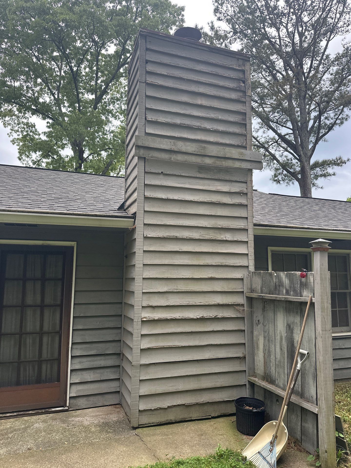Marietta, GA Exterior Painting Transformation with Blue Paint by Nelson Exteriors