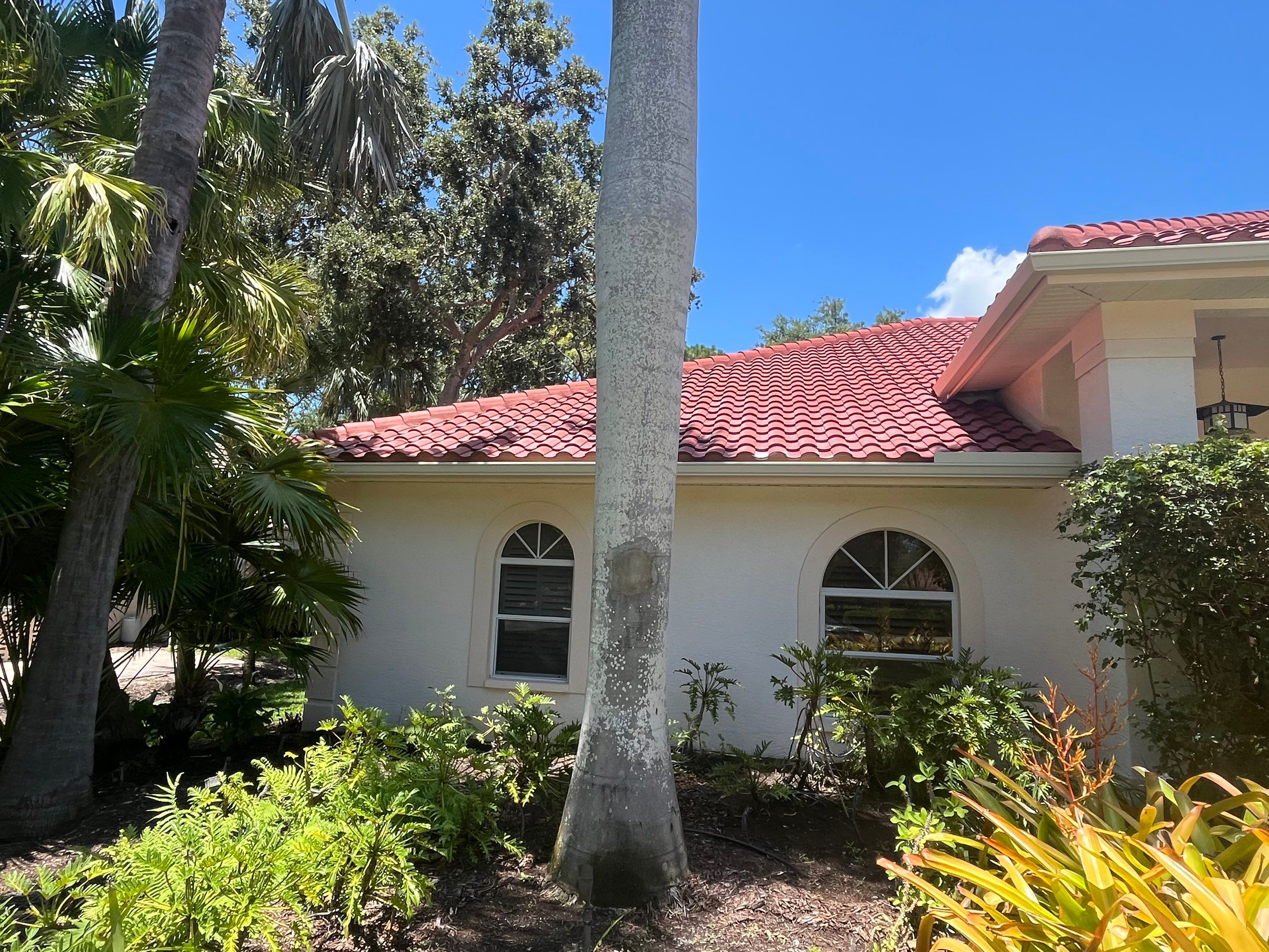 Splash Guard Gutters for Rainy Season Protection in Osprey FL by Gutter Professors