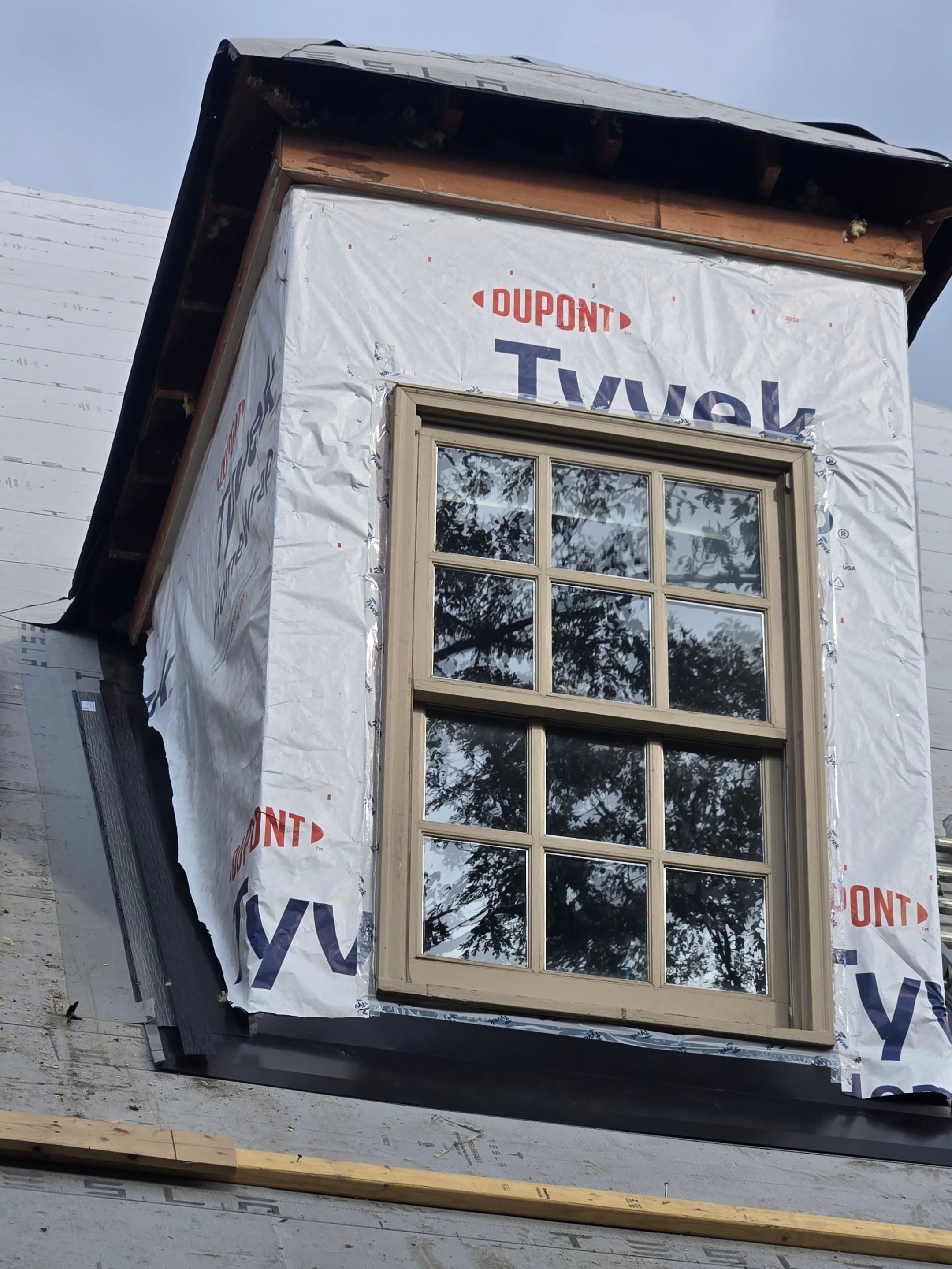 Extravagant Tesla Solar Roof in Maryland by American Home Contractors