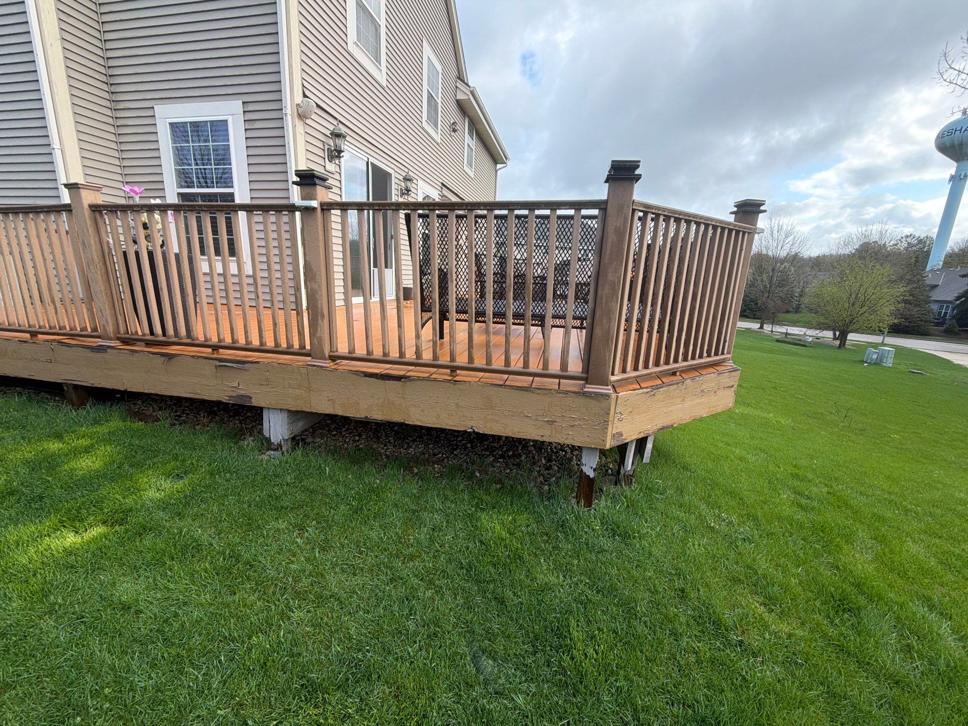 Elevated Wood Deck Refinishing and Railing Restoration in Waukesha by OCS Contracting Services