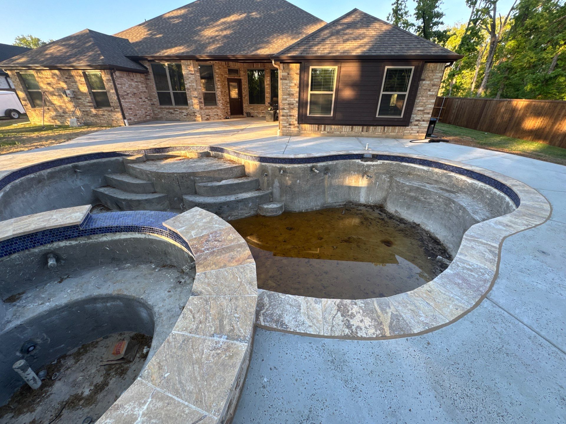 Resort-Style Freeform Pool and Spa Remodel by Pinnacle Pools and Spas - DFW