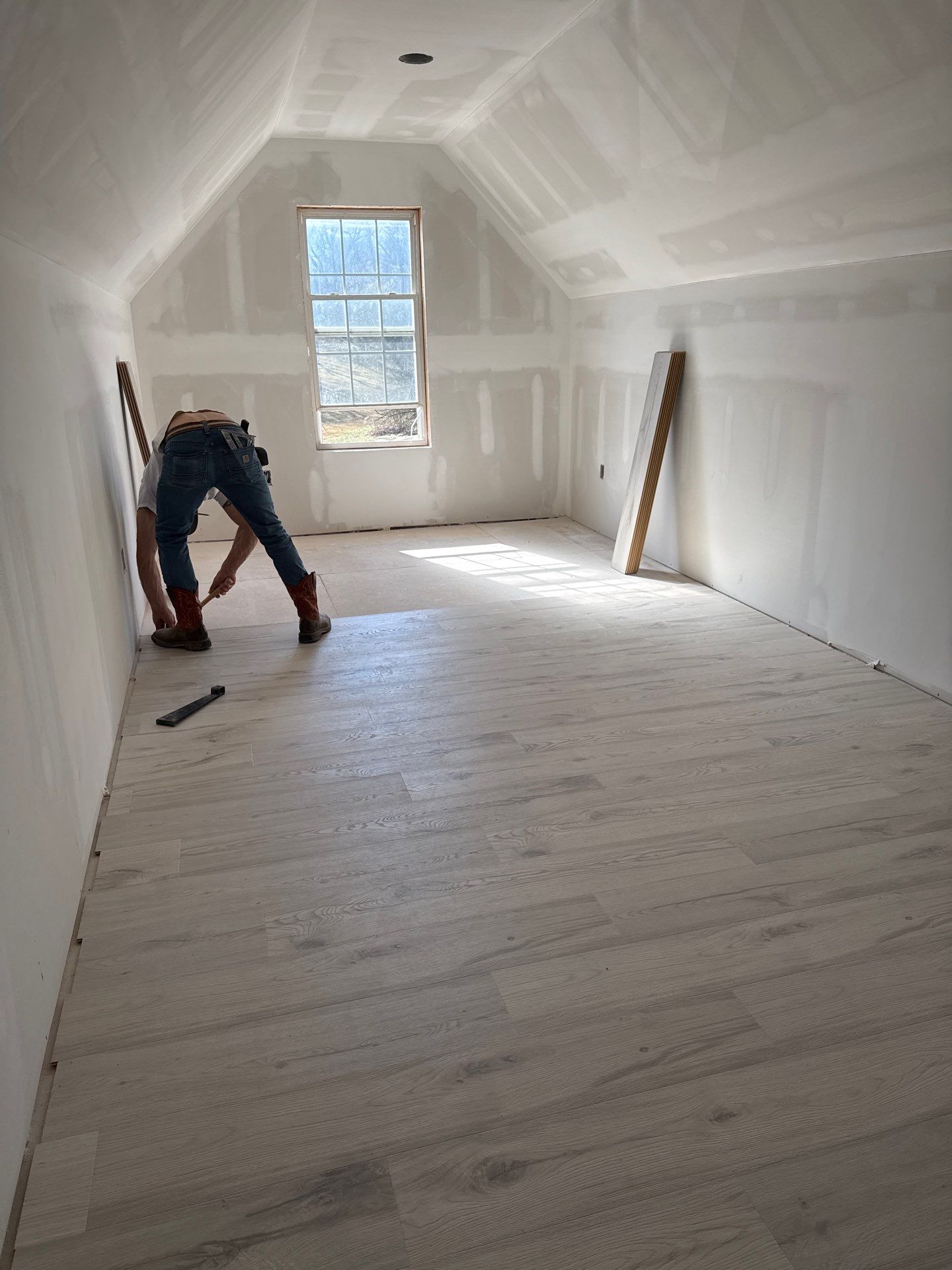 Attic Conversion by Skilled Construction LLC