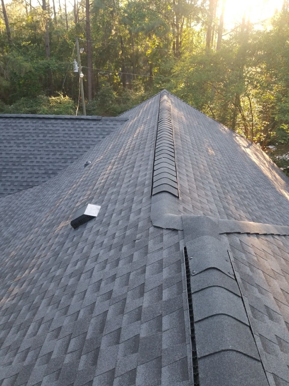 Residential Roofing Installation using Roof Replacement by American Roofing & Construction LLC