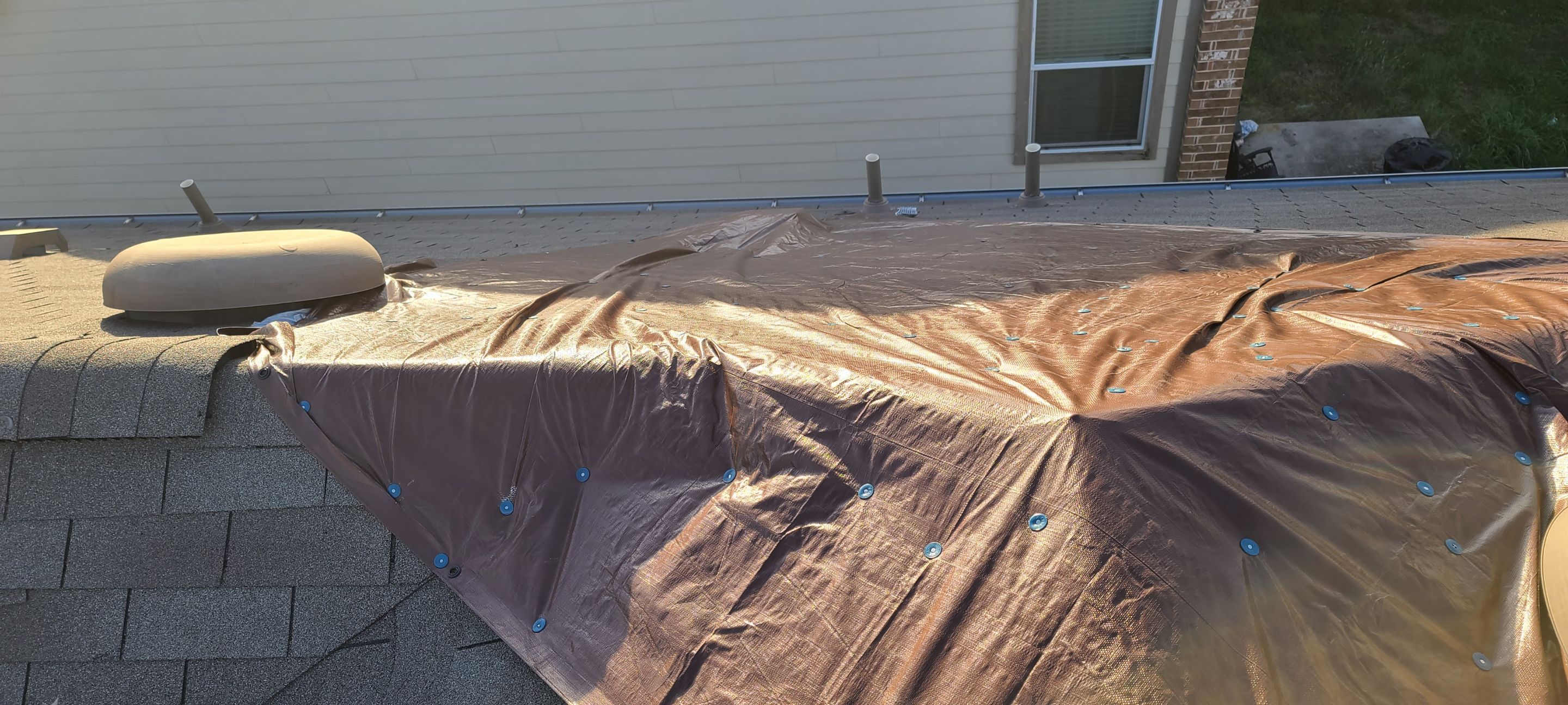 Austin Roof Storm Damage Assessment and Emergency Tarping Service by Caliber Restoration LLC