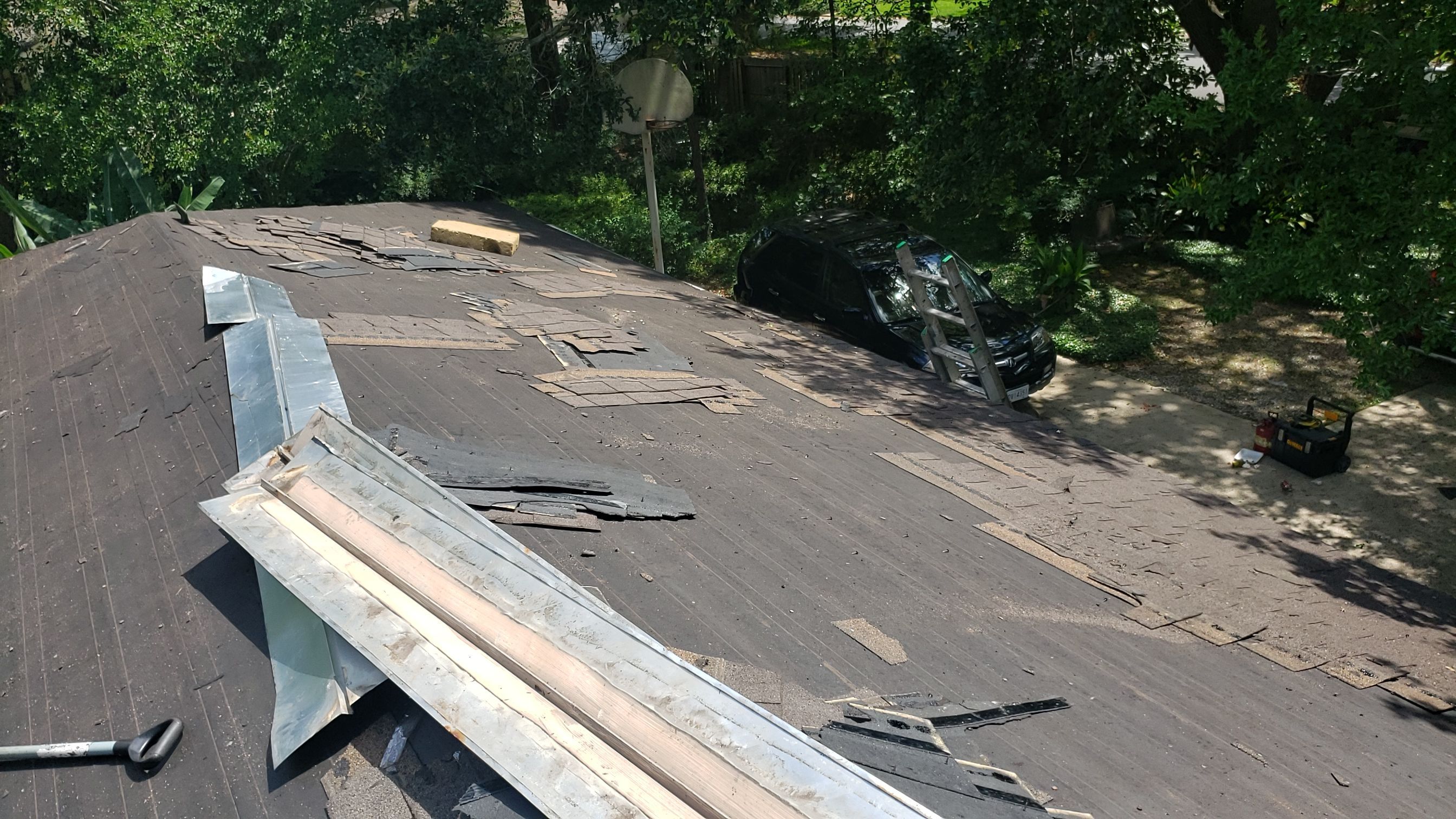 Residential Roofing Installation using Roof Replacement by American Roofing & Construction LLC