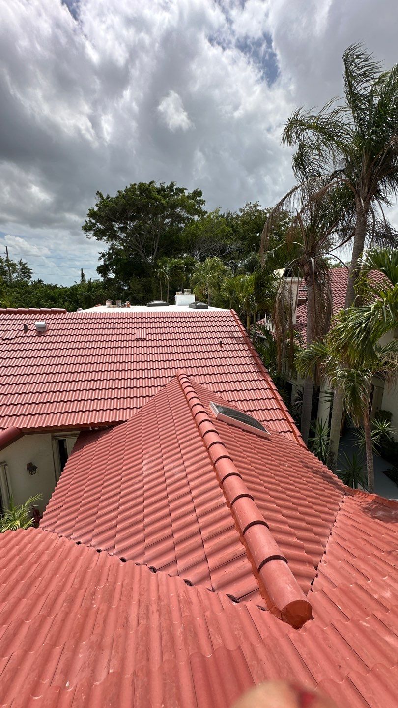 Residential Tile Re-Roof and TPO Flat Roof Installation in Boca Raton by AJF ROOFING INC