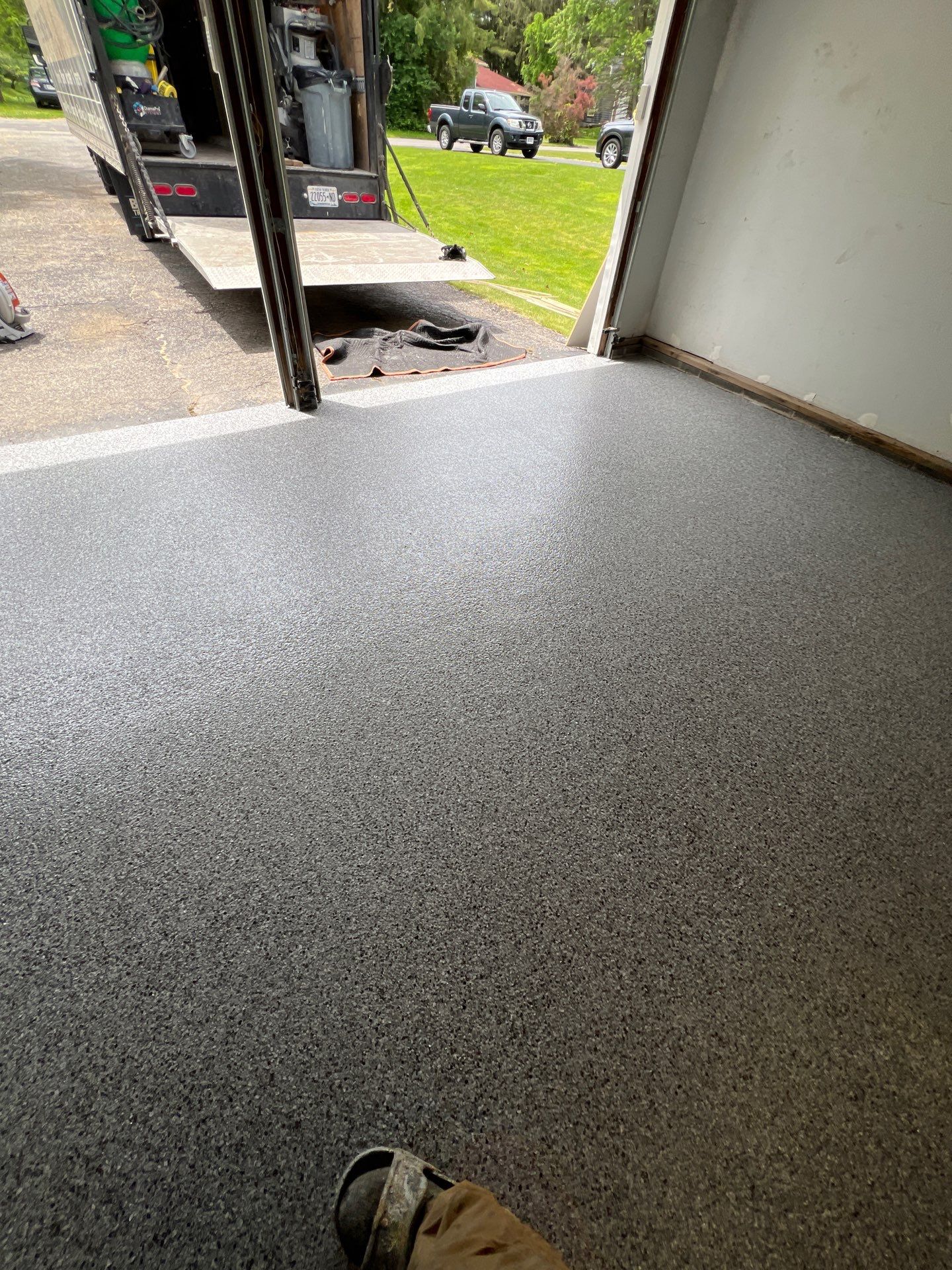 Silverado garage floor coating by NG Masonry & Construction LLC