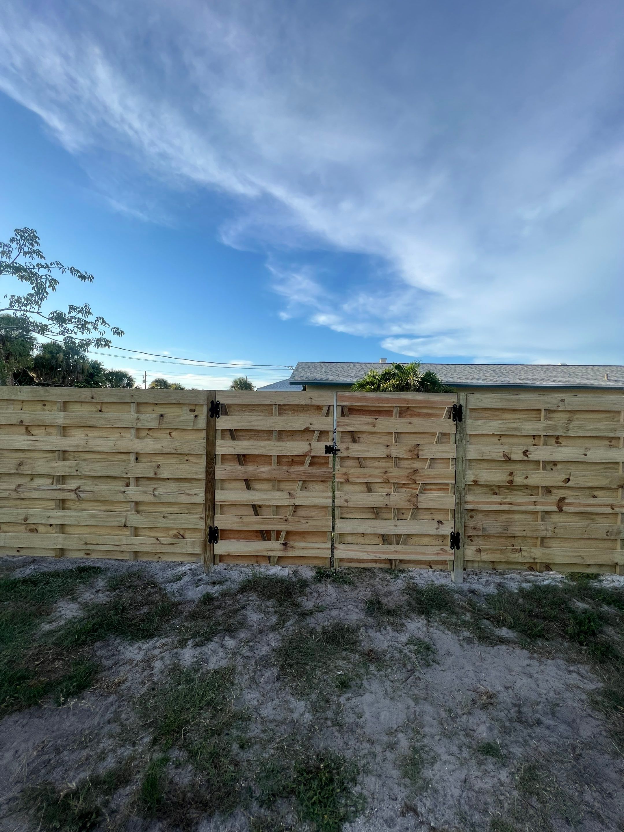Wood Fence Installation using Horizontal Shadowbox Wood Privacy Fence by Asap fence and gates, LLC