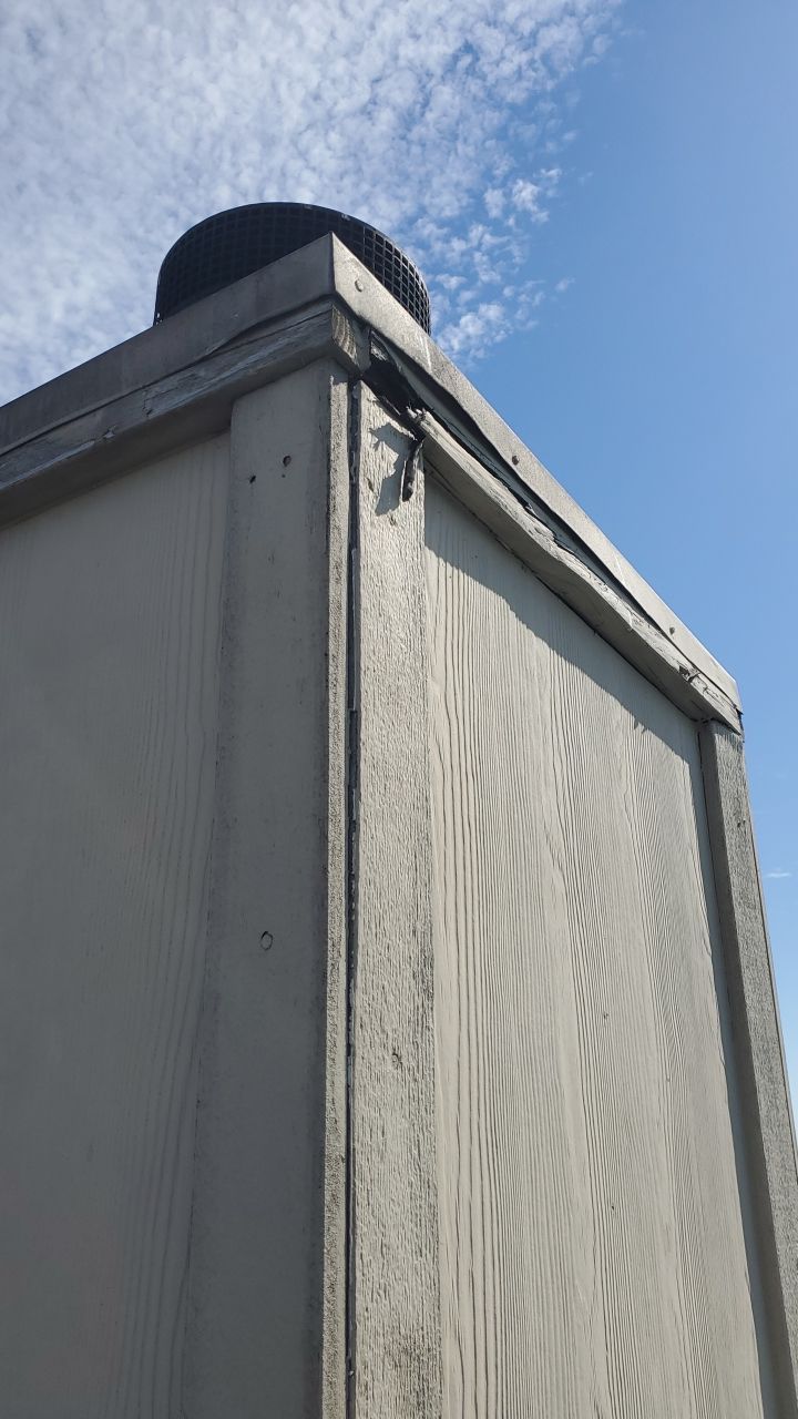 Residential Roofing Repair Replacing Chimney Cap by Lighthouse Roofing