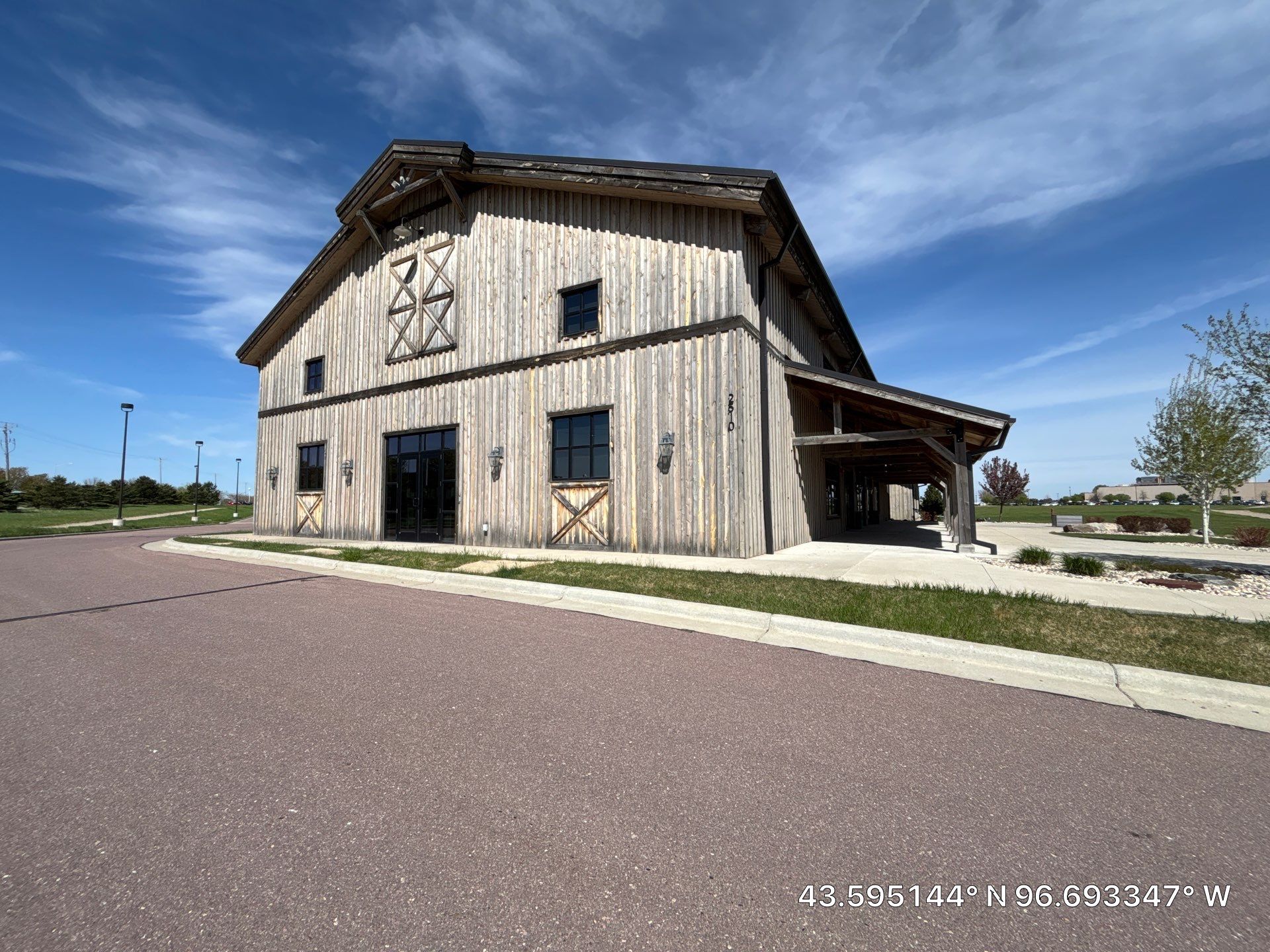 Commercial Exterior Wood Staining for Sanford Barn in Sioux Falls by Select Painting, Coatings & Garage Cabinets