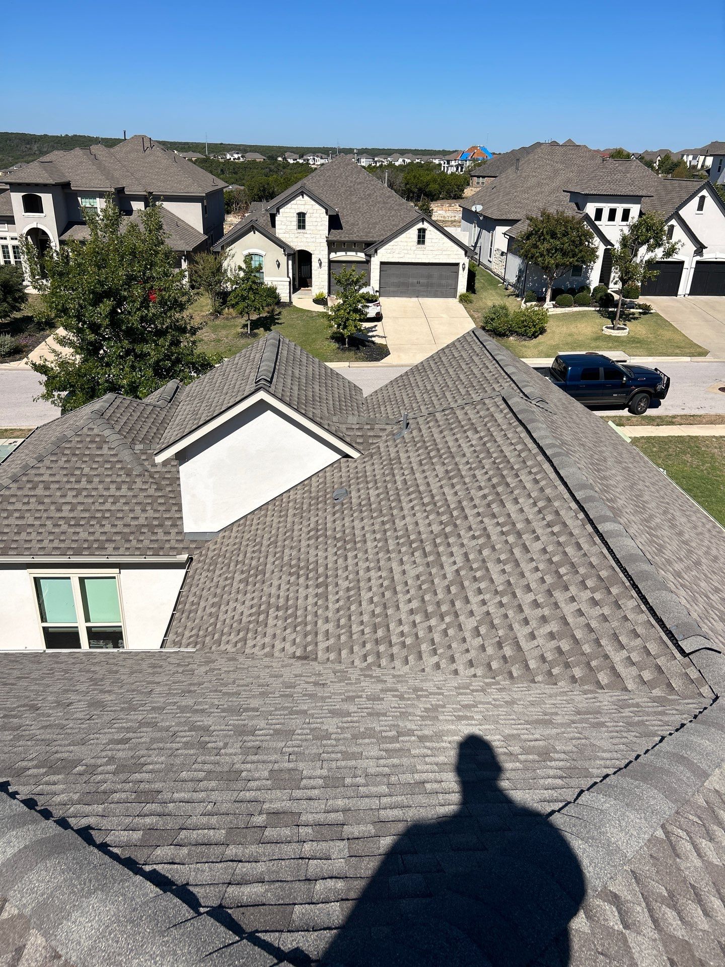 Residential Roof Replacement using GAF - Armorshield ll - Weathered Wood by Action Exteriors Austin