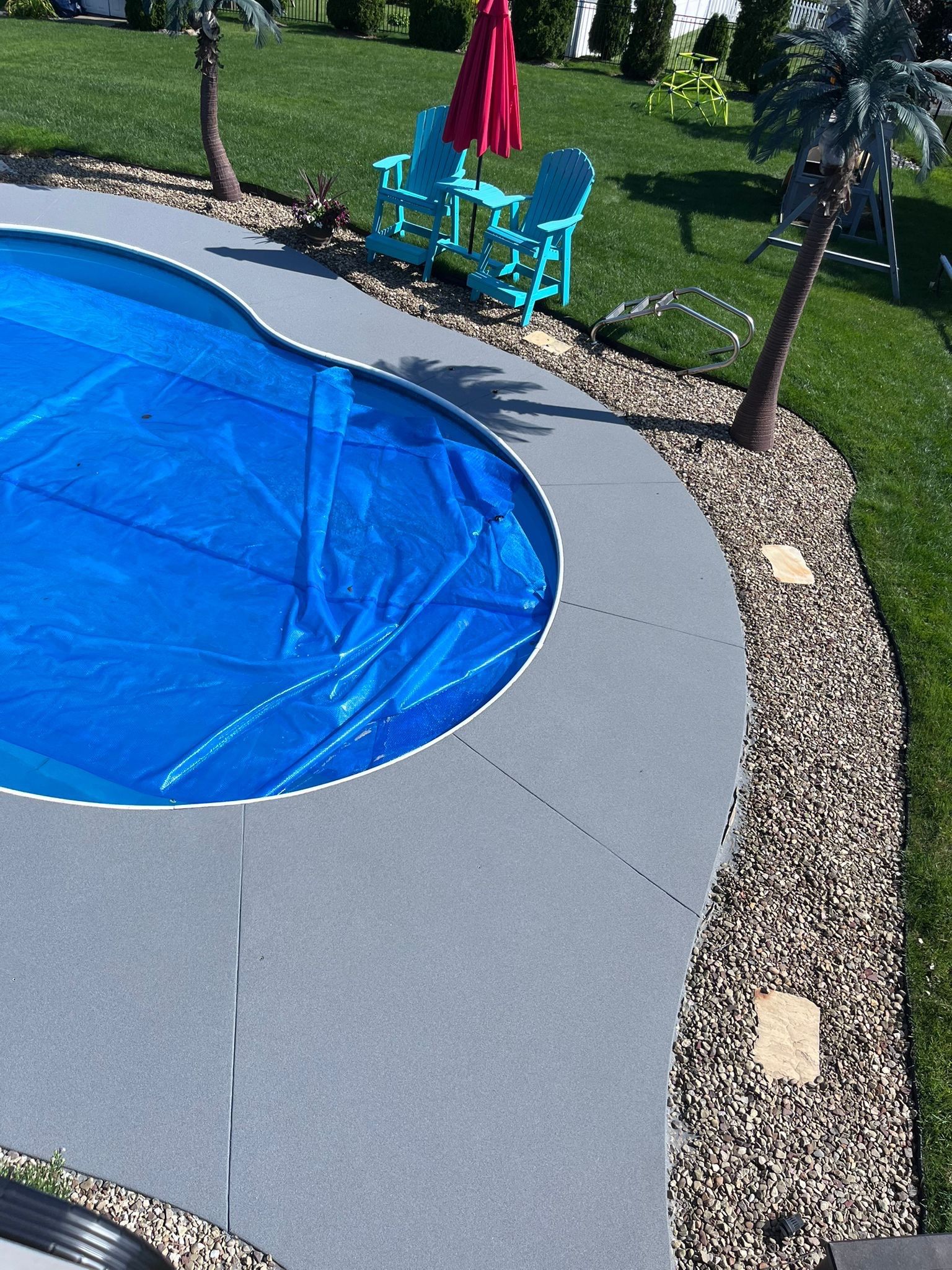 Twilight Pool Deck / Patio Project in Beaver falls by Floors in a Day, Inc