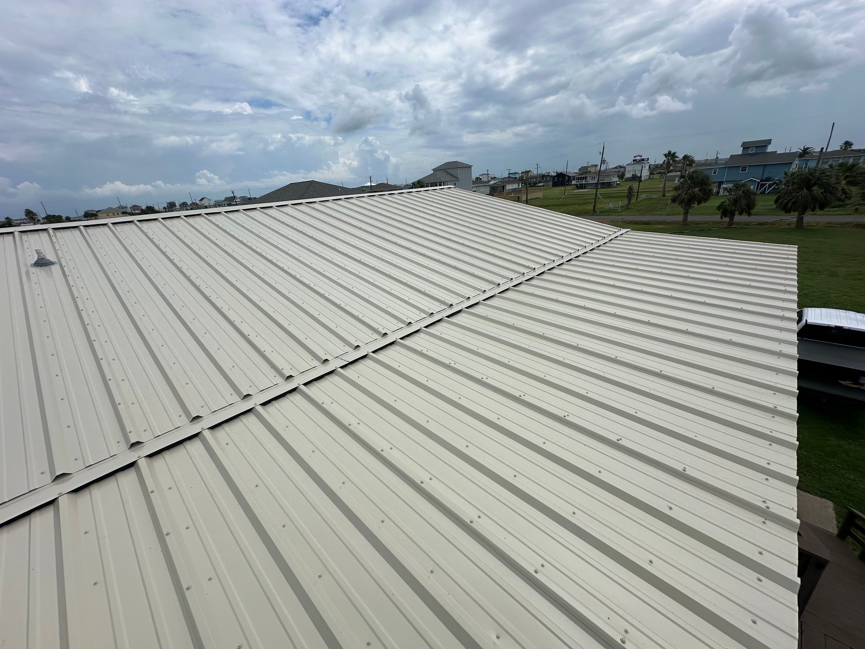 Residential Roofing Installation using R-Panel Metal Roofing on Galveston Island by Core Four Roofing