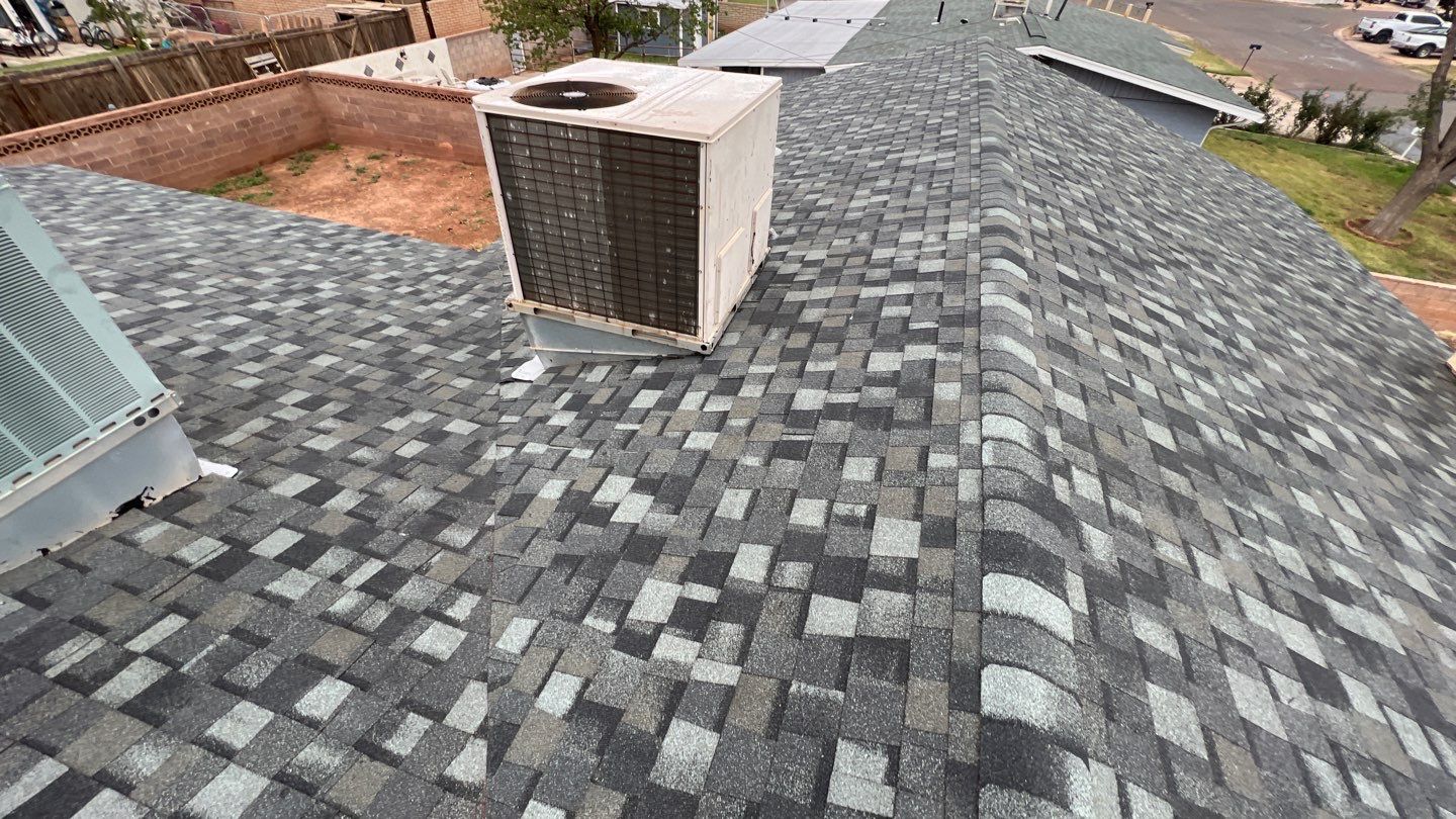 Onyx Black Shingles by Reimagine Roofing