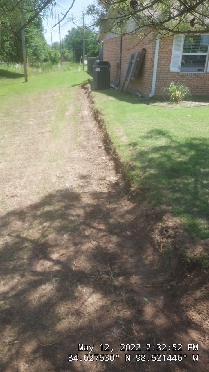 Retaining Wall using Rocks by Clays Services Inc