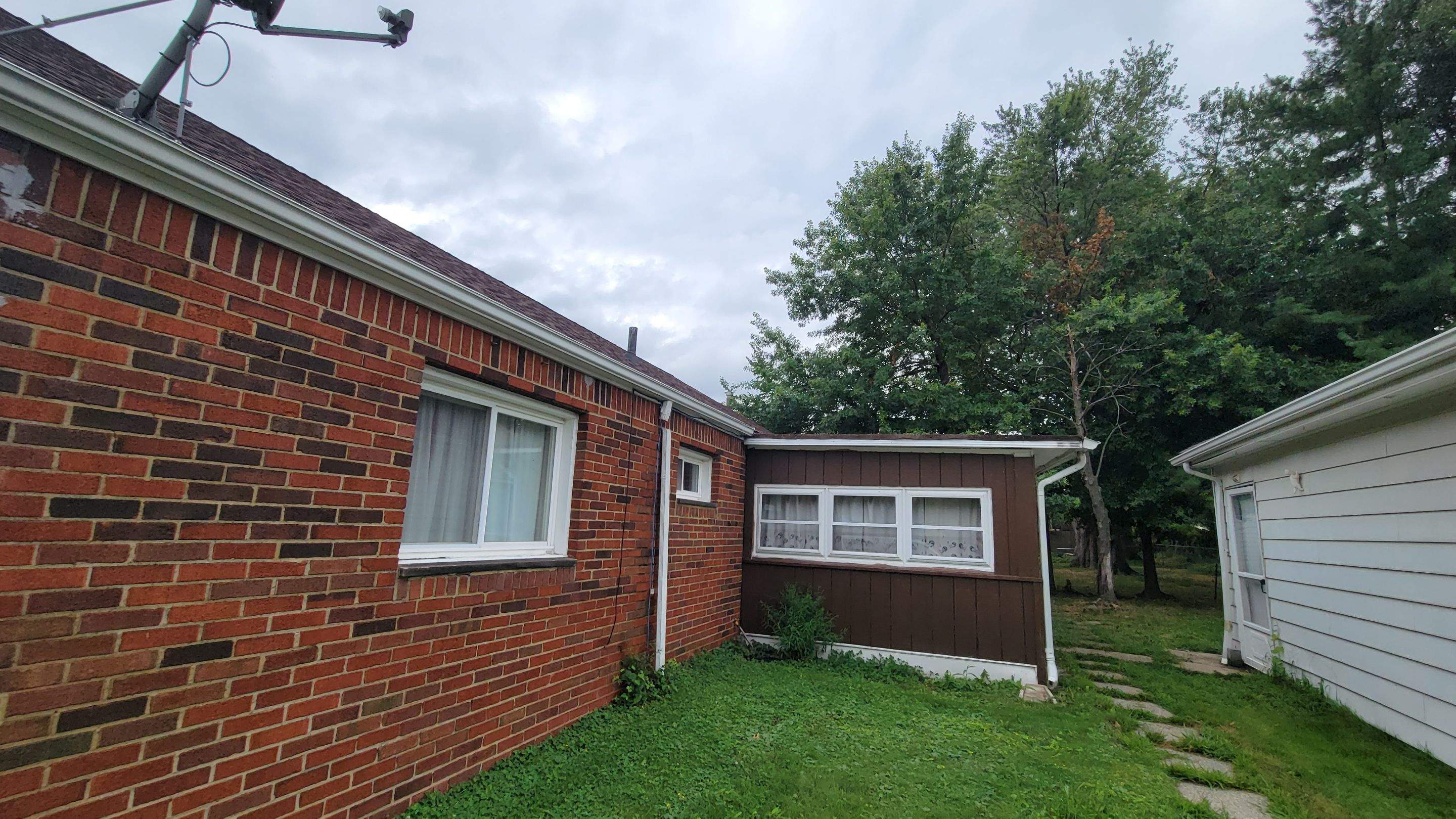 Tree Destroyed Patio Room by Absolute Roofing and Construction