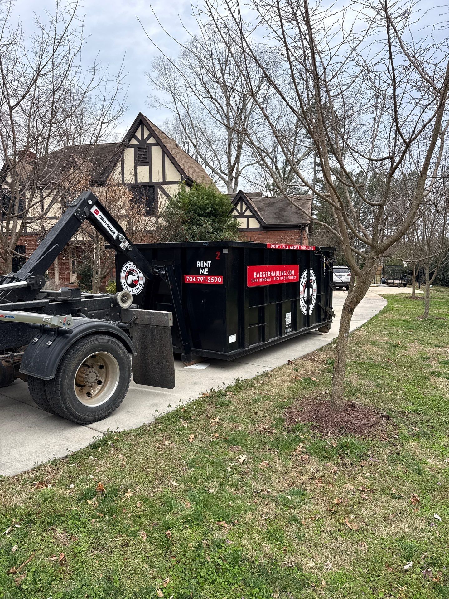 Job site clean up in Matthews by Badger Hauling